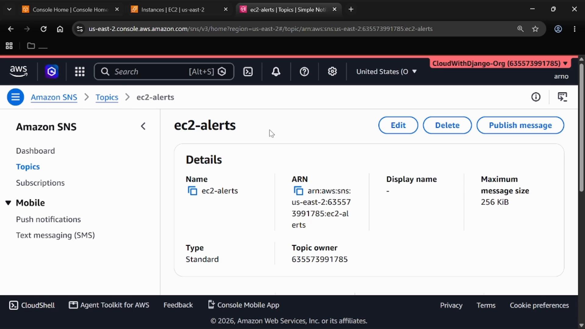 A screenshot of the AWS Management Console showing the Amazon SNS Topics page for a topic named "ec2-alerts." The topic details (ARN, owner, max message size) are visible with buttons to Edit, Delete, and Publish message.