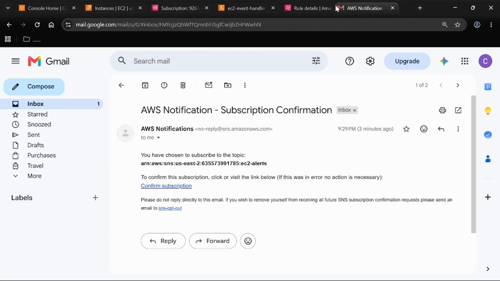 A Gmail window showing an open message titled "AWS Notification - Subscription Confirmation" from no-reply@sns.amazonaws.com with a confirmation link for an AWS SNS topic. The left sidebar shows mail folders like Inbox, Starred, and Drafts.