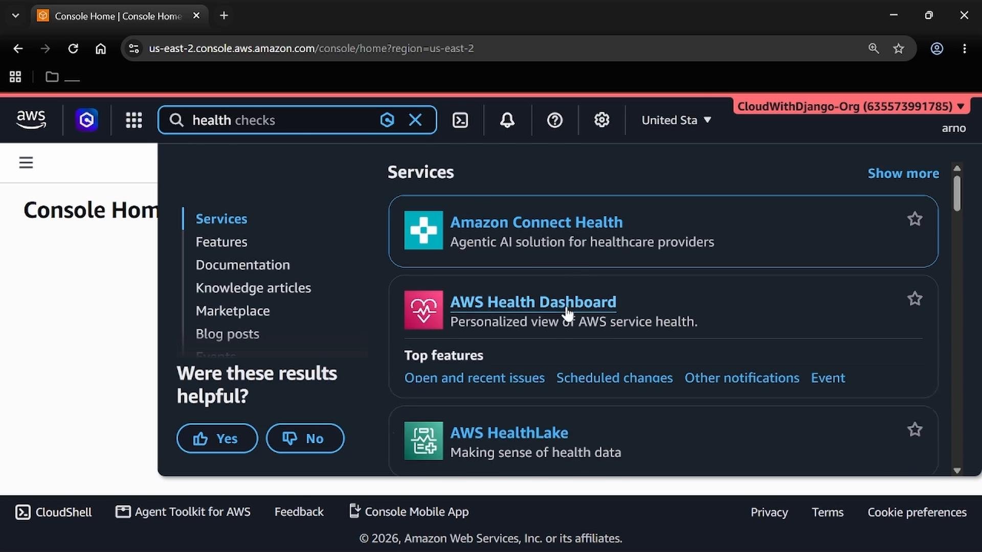 A screenshot of the AWS Management Console search results for "health checks," showing service cards like Amazon Connect Health, AWS Health Dashboard, and AWS HealthLake. The console is displayed in a dark theme with navigation and account elements visible at the top.
