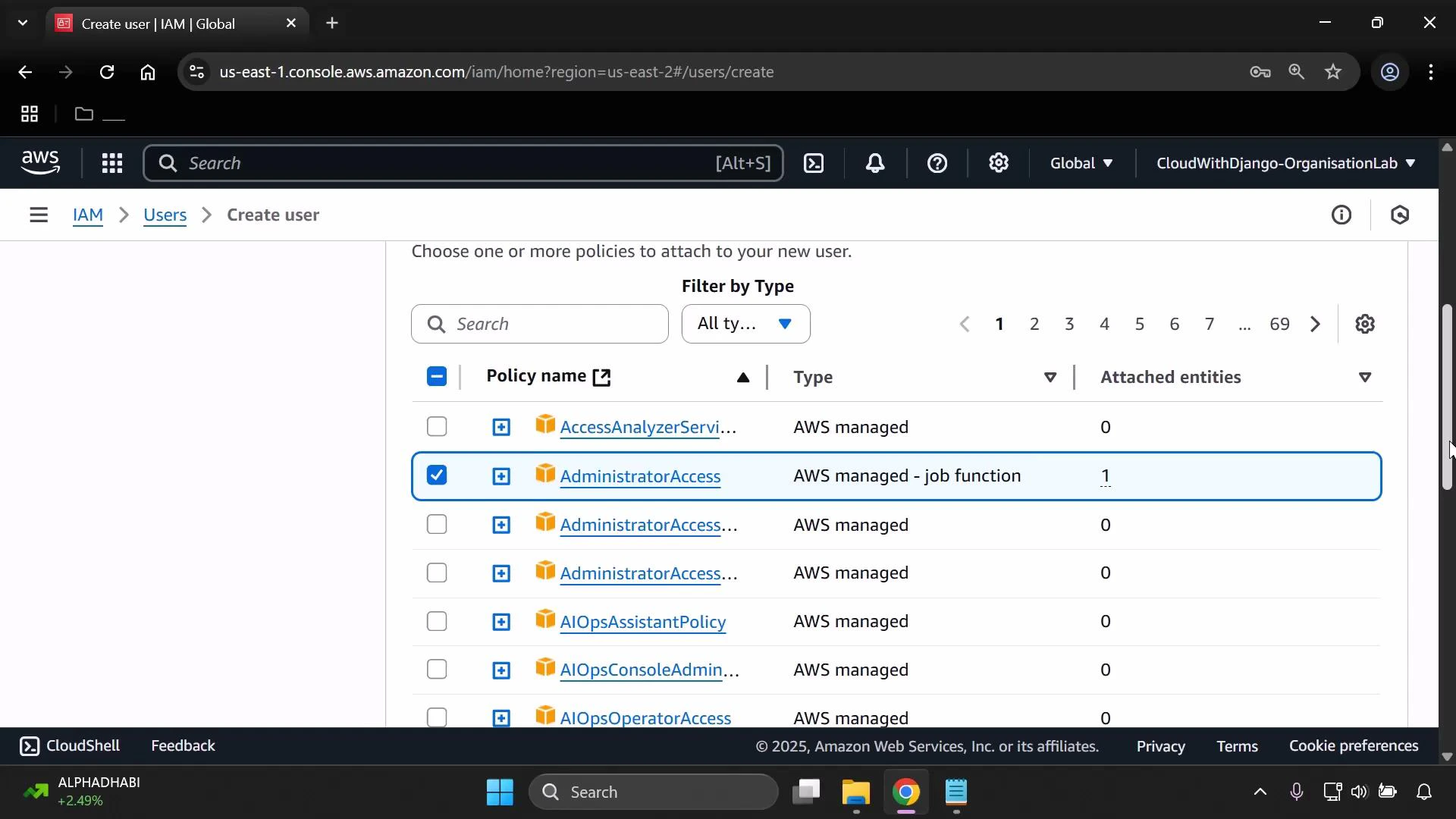 A screenshot of the AWS IAM console on the "Create user" page showing a list of policies to attach. The table shows AWS-managed policies with "AdministratorAccess" checked and pagination controls on the right.