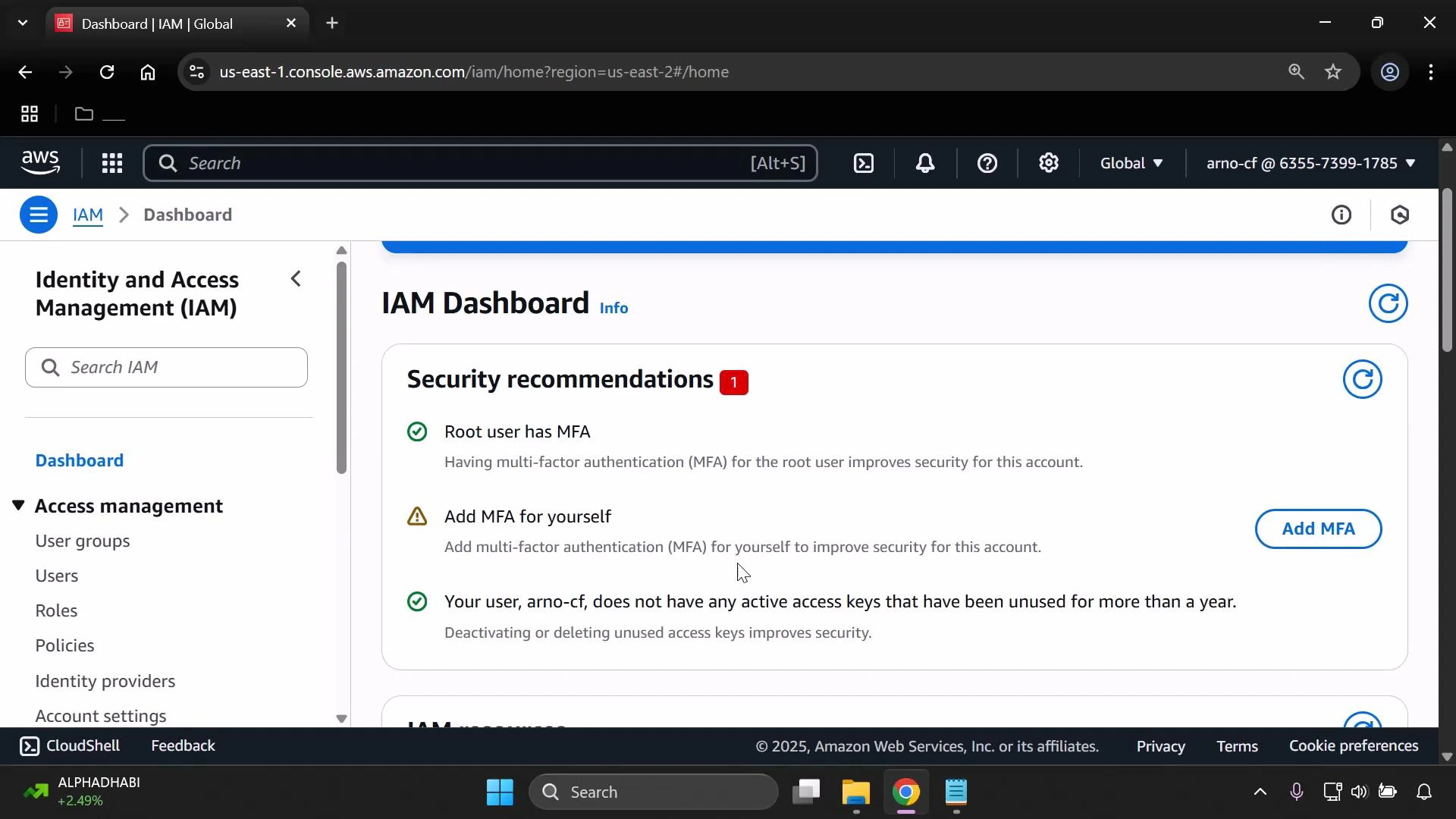 Screenshot of the AWS Identity and Access Management (IAM) dashboard. It shows security recommendations including that the root user has MFA, a prompt to "Add MFA for yourself," and a note about user access key status.
