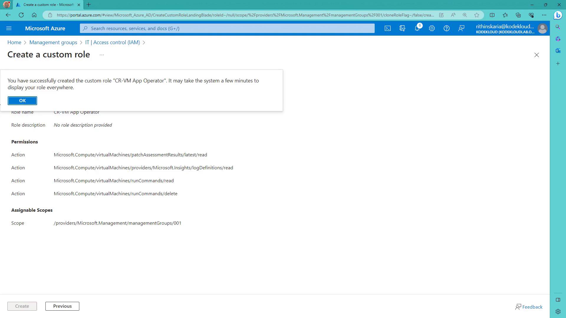 A screenshot of the Microsoft Azure portal showing a confirmation dialog that a custom role named "CR-VM App Operator" was successfully created. The page also displays the role's permissions (virtual machine actions) and its assignable scope.