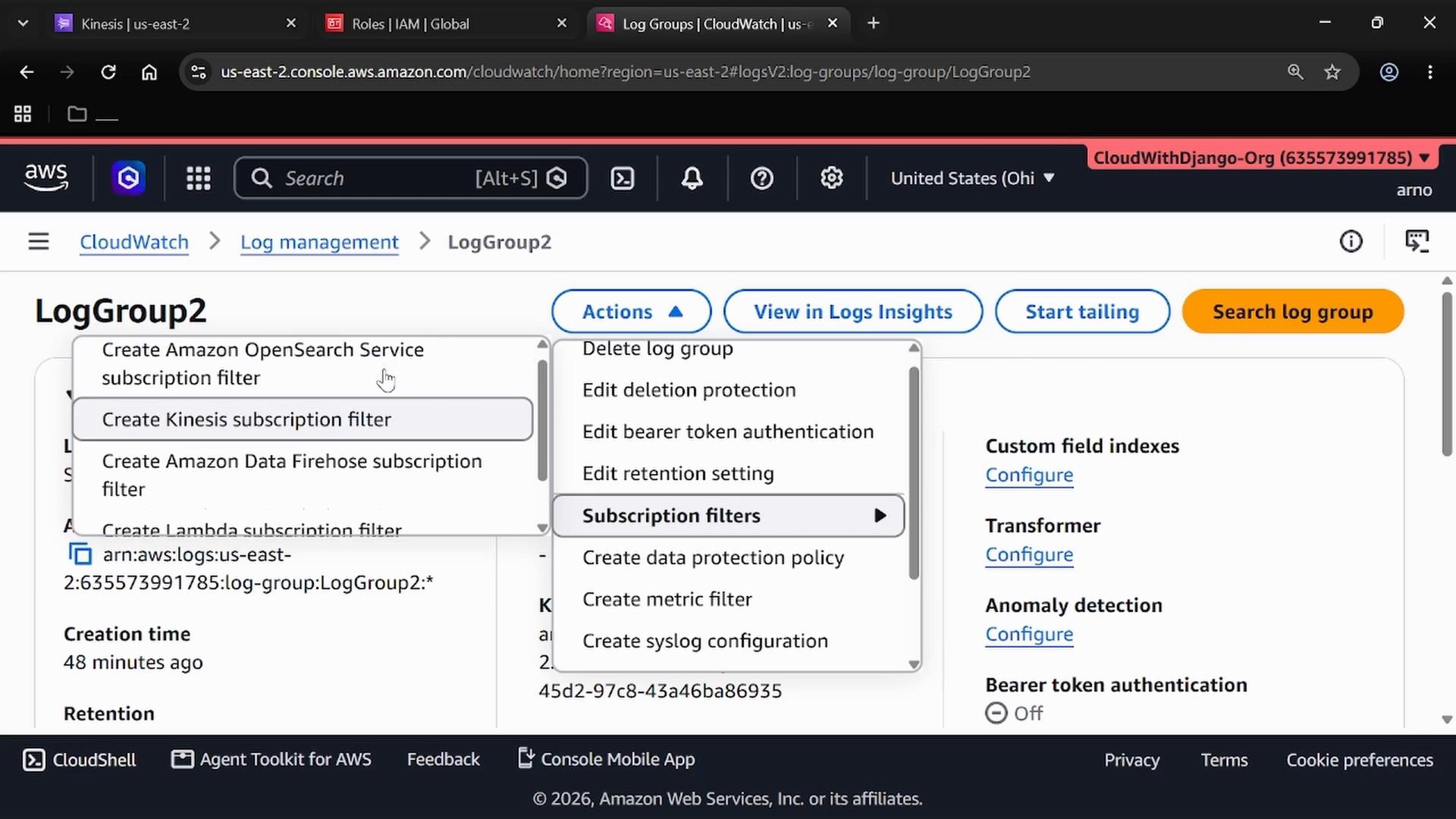 A screenshot of the AWS CloudWatch console showing a log group named "LogGroup2" with the Actions menu and Subscription filters expanded (options like Create Kinesis subscription filter). The top shows navigation buttons such as View in Logs Insights, Start tailing, and Search log group.