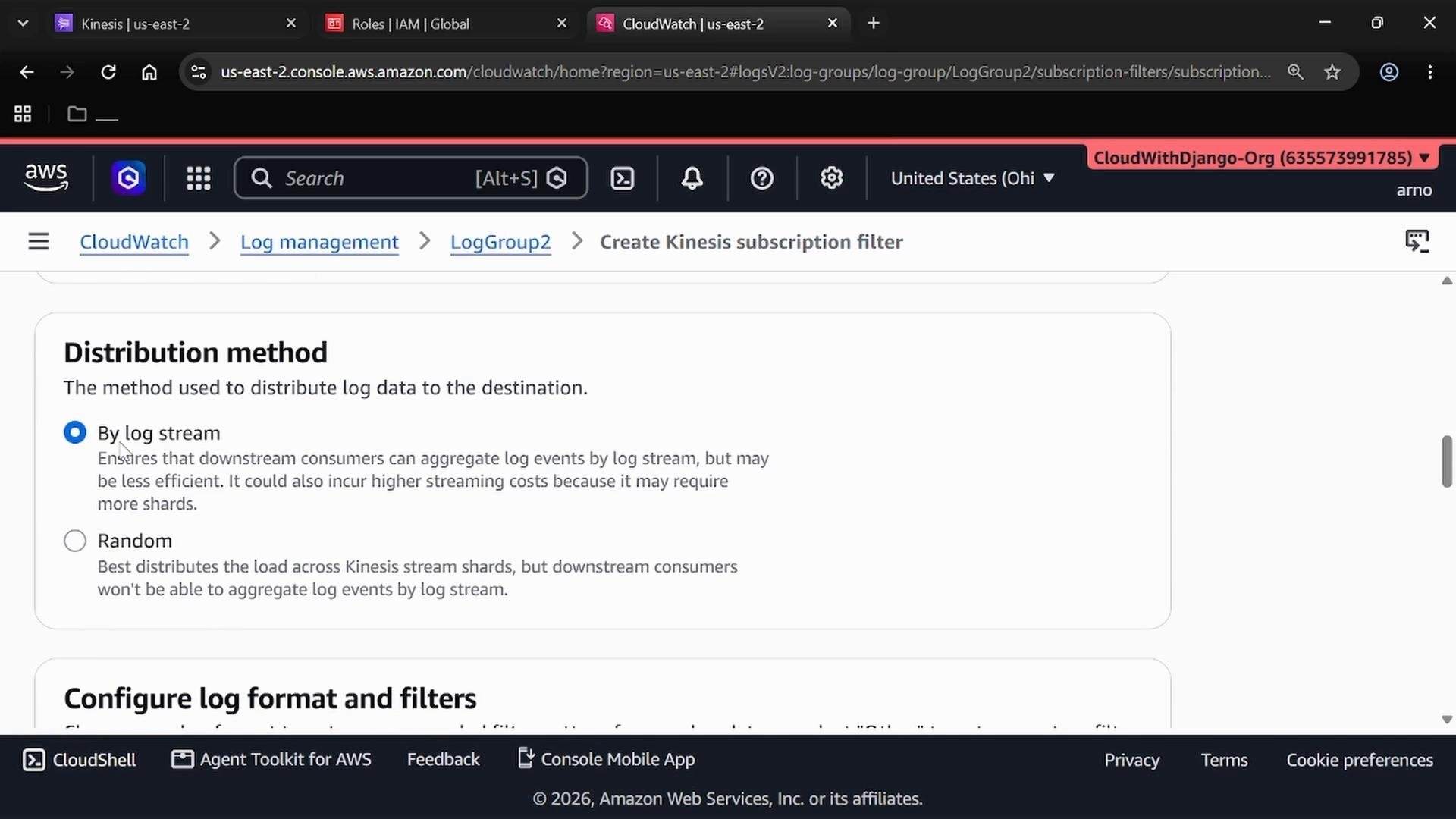 A screenshot of the AWS CloudWatch console on the "Create Kinesis subscription filter" page showing the "Distribution method" section, with "By log stream" selected and "Random" listed as the other option.