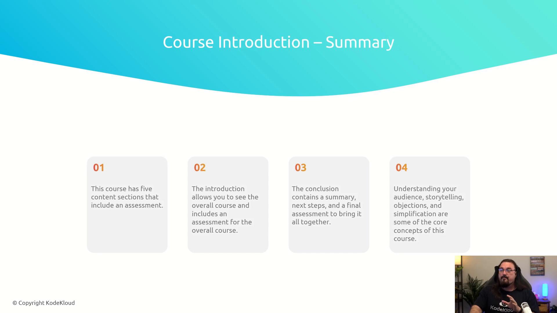 A presentation slide titled "Course Introduction – Summary" showing four rounded numbered boxes with brief course points. In the bottom-right there's a small video thumbnail of a bearded man with long hair speaking.