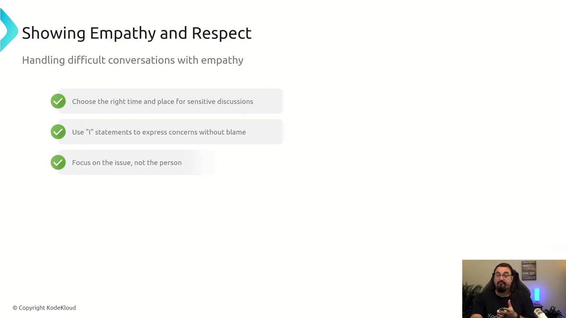 A presentation slide titled "Showing Empathy and Respect" lists three tips for handling difficult conversations: choose the right time and place, use "I" statements, and focus on the issue, not the person. A small presenter video thumbnail appears in the bottom-right corner.