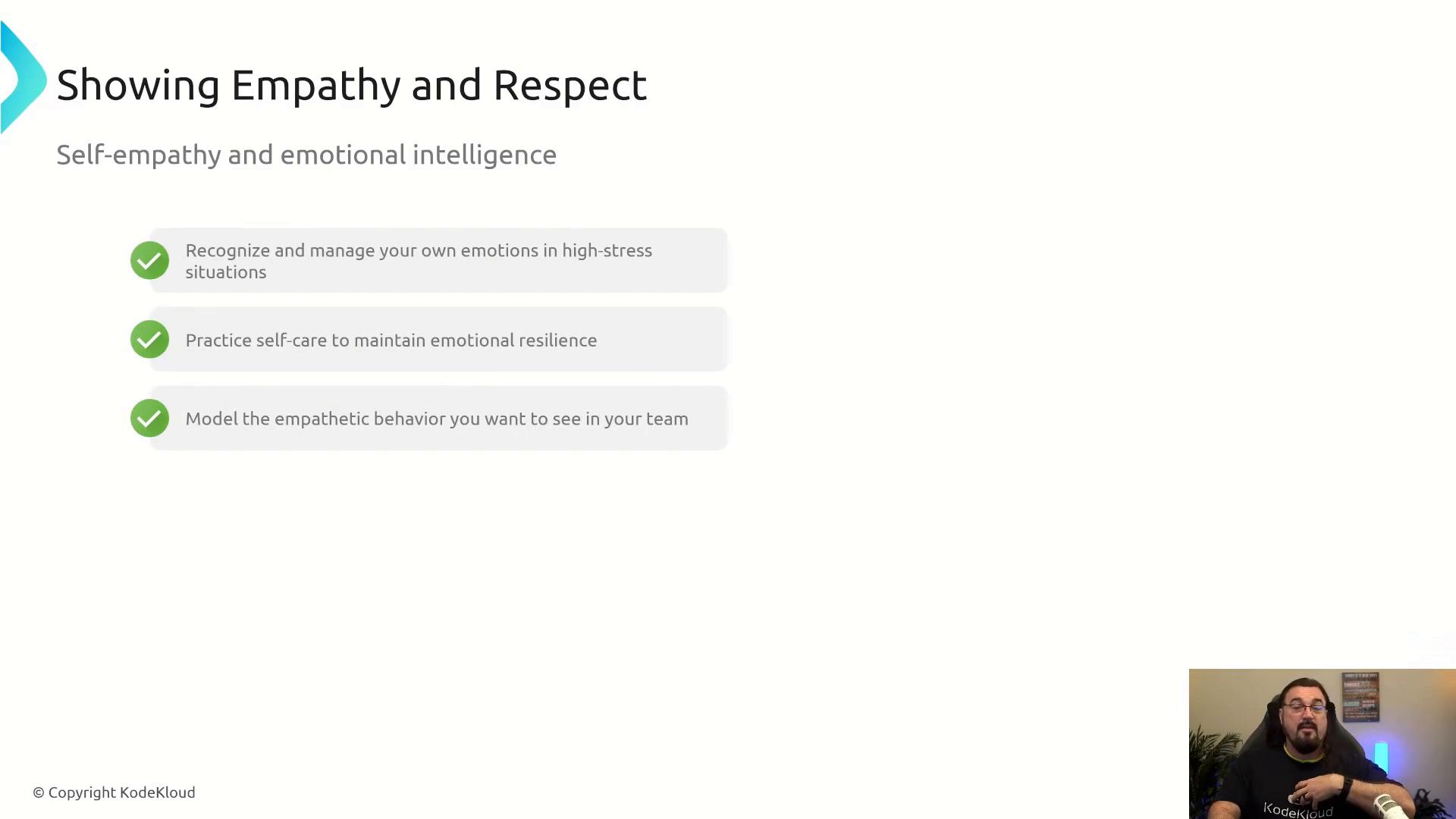A presentation slide titled "Showing Empathy and Respect" with the subtitle "Self-empathy and emotional intelligence" and three check-marked tips about managing emotions, practicing self-care, and modeling empathetic behavior. A small video thumbnail of a person speaking appears in the lower-right corner.