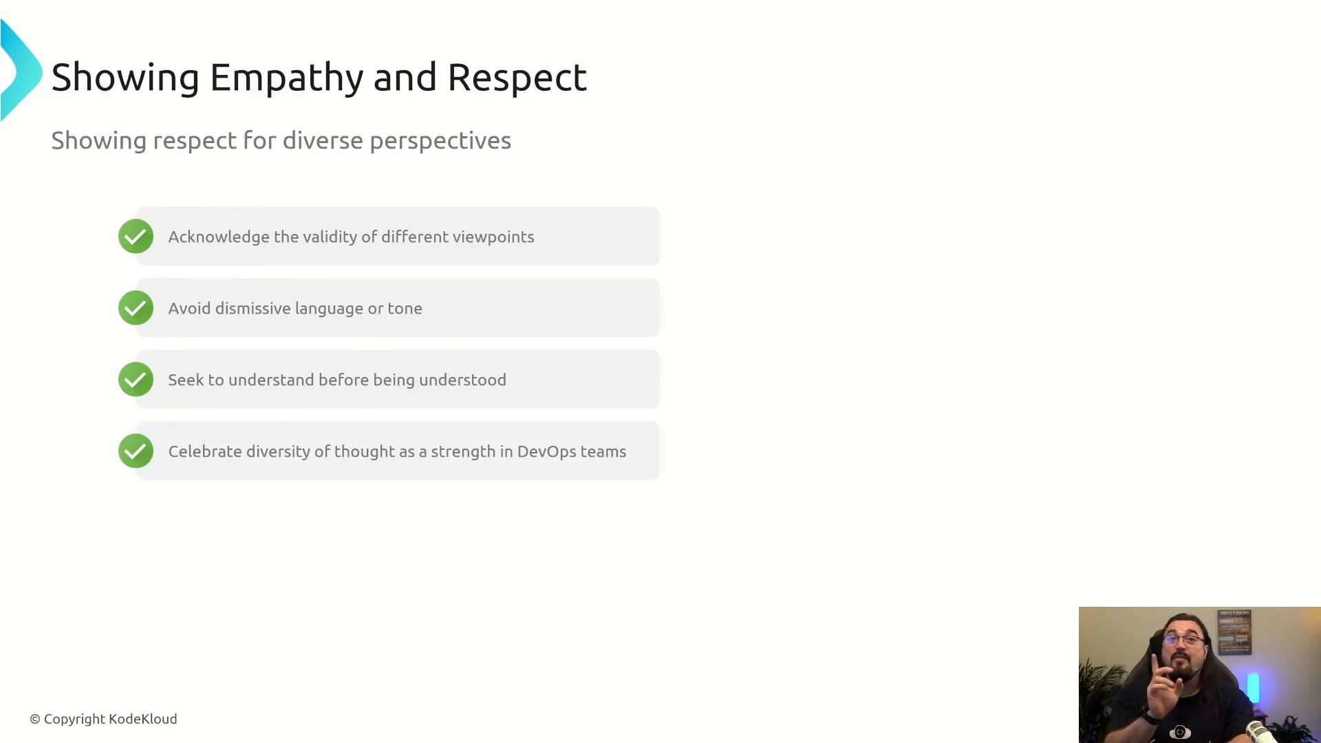 A presentation slide titled "Showing Empathy and Respect" with a checklist of points about acknowledging different viewpoints, avoiding dismissive language, seeking to understand, and celebrating diversity. A small video thumbnail in the bottom-right shows a man speaking and gesturing.