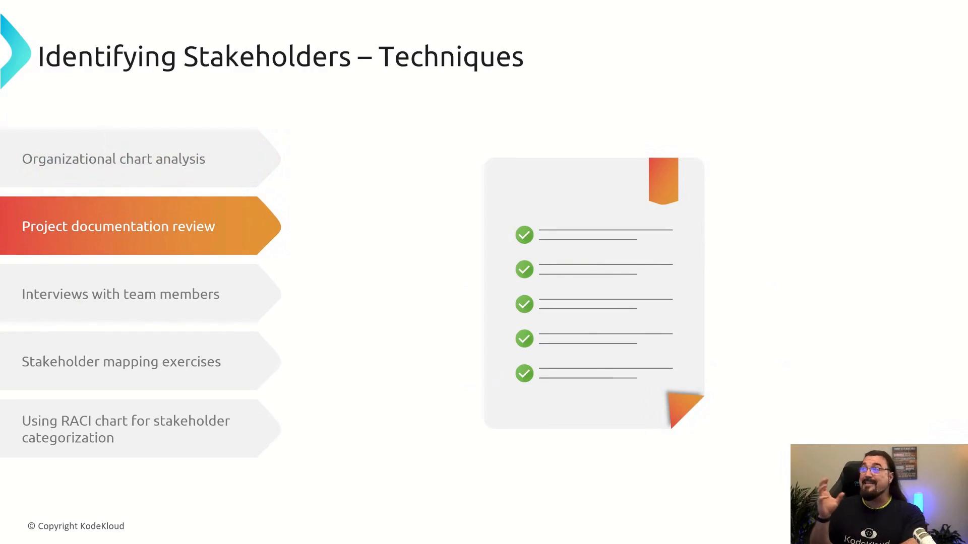 A presentation slide titled "Identifying Stakeholders – Techniques" showing a list of methods (like project documentation review and interviews) on the left, a checklist-style document graphic on the right, and a small webcam feed of a presenter in the bottom-right.