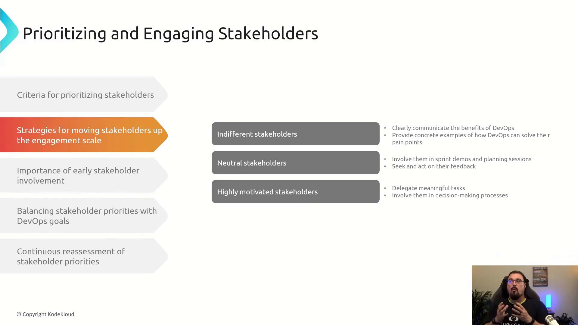 A presentation slide titled "Prioritizing and Engaging Stakeholders" that lists criteria and strategies for moving stakeholders up the engagement scale, with gray boxes for indifferent, neutral, and highly motivated stakeholders and short action points. A small webcam video of the presenter appears in the bottom-right corner.