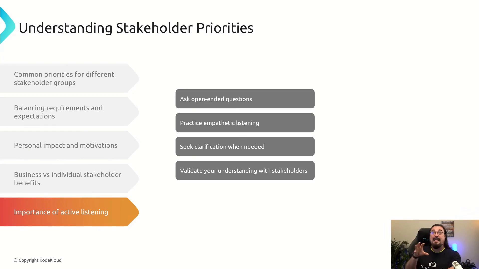 A presentation slide titled "Understanding Stakeholder Priorities" showing key points about stakeholder concerns and active listening tips (e.g., ask open-ended questions, practice empathetic listening). A small webcam inset of a presenter appears in the lower-right corner.