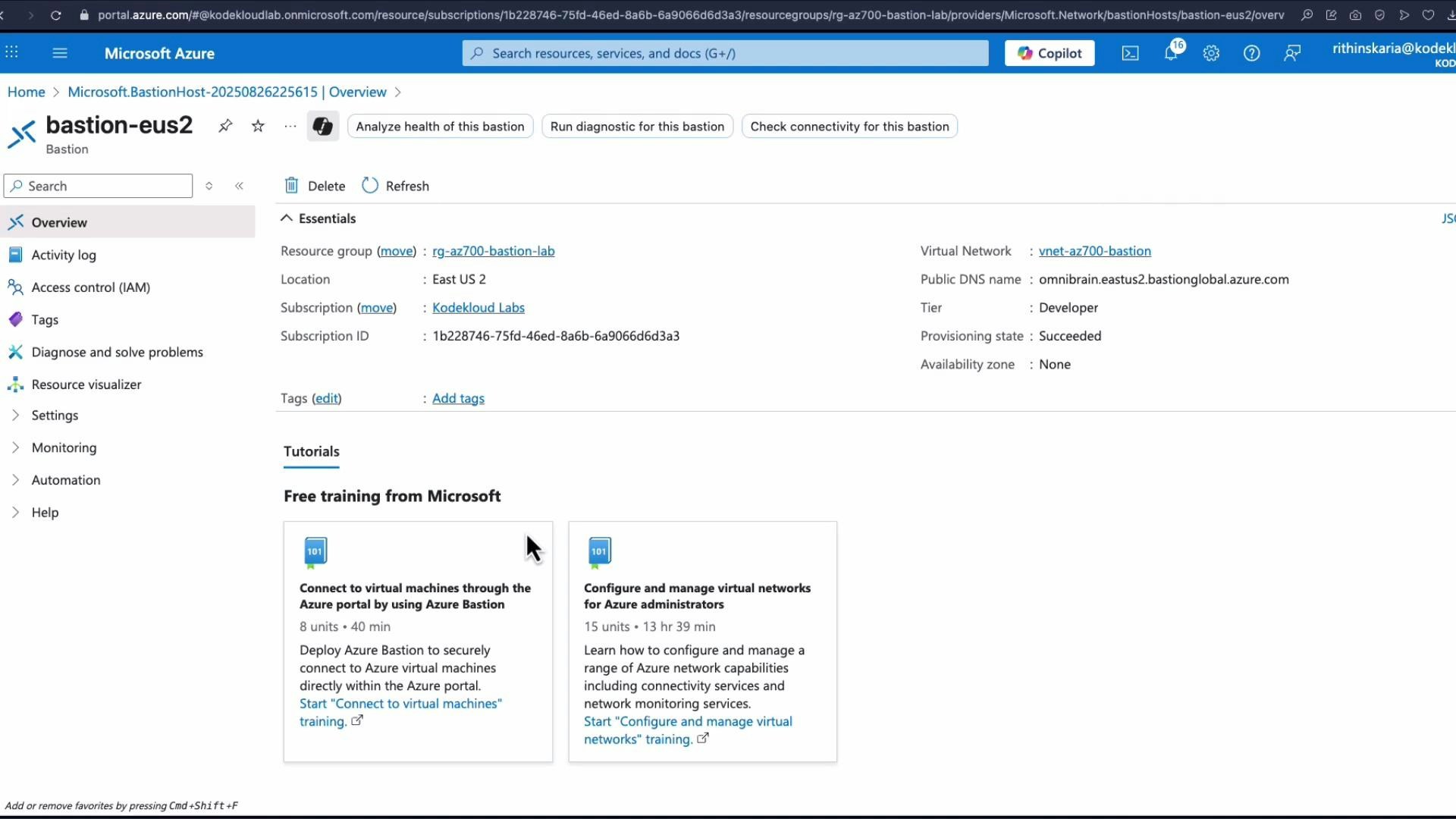 A screenshot of the Microsoft Azure portal showing the overview page for a Bastion host named "bastion-eus2." The page displays essentials (resource group, location, subscription, virtual network, provisioning state) and two Microsoft training cards about Azure Bastion and virtual networks.