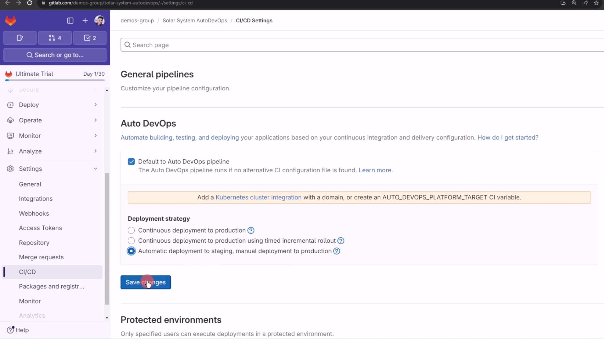 Screenshot of a GitLab project's CI/CD Settings page showing Auto DevOps configuration and deployment strategy radio buttons. The left navigation menu is visible and a blue "Save changes" button is shown.