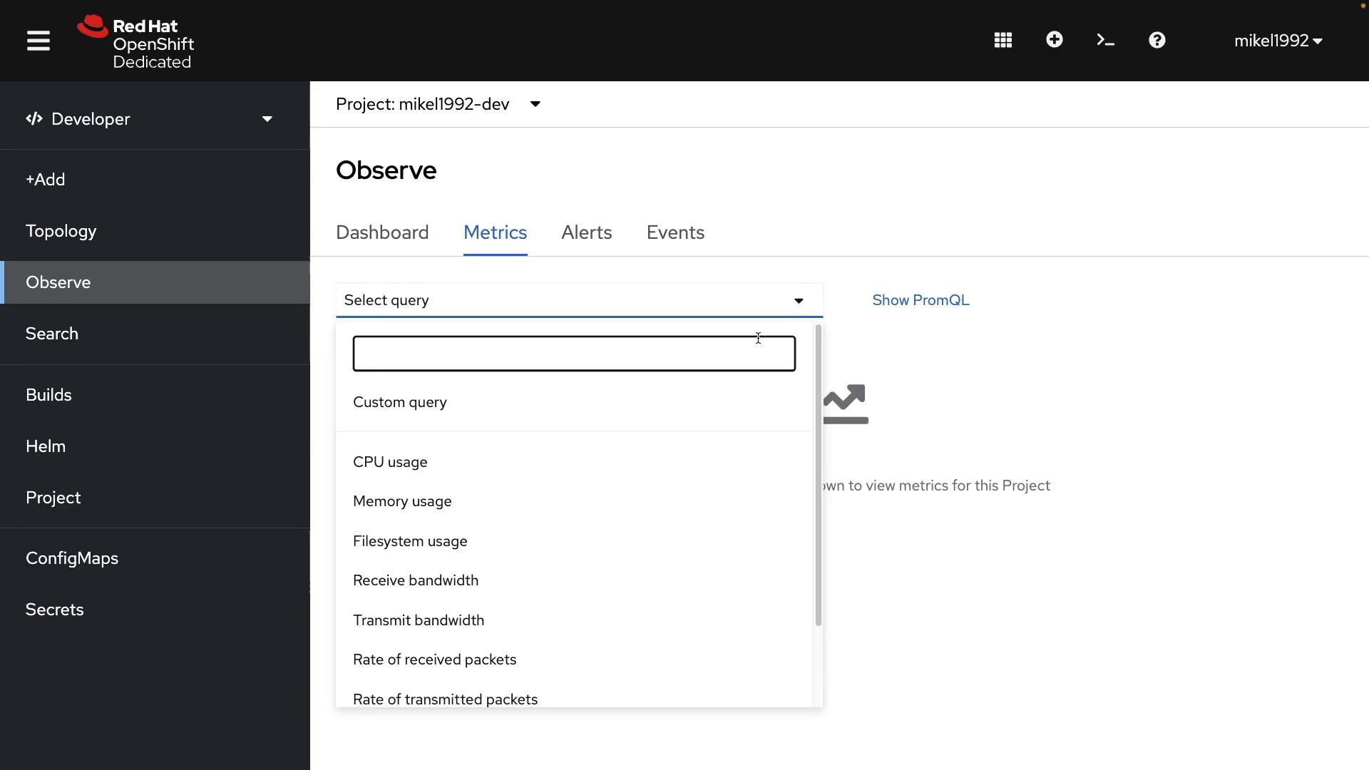 A screenshot of the Red Hat OpenShift Dedicated web console showing the Observe → Metrics page. A dropdown menu for selecting queries is open, listing metrics like CPU usage, memory usage, bandwidth and packet rates.
