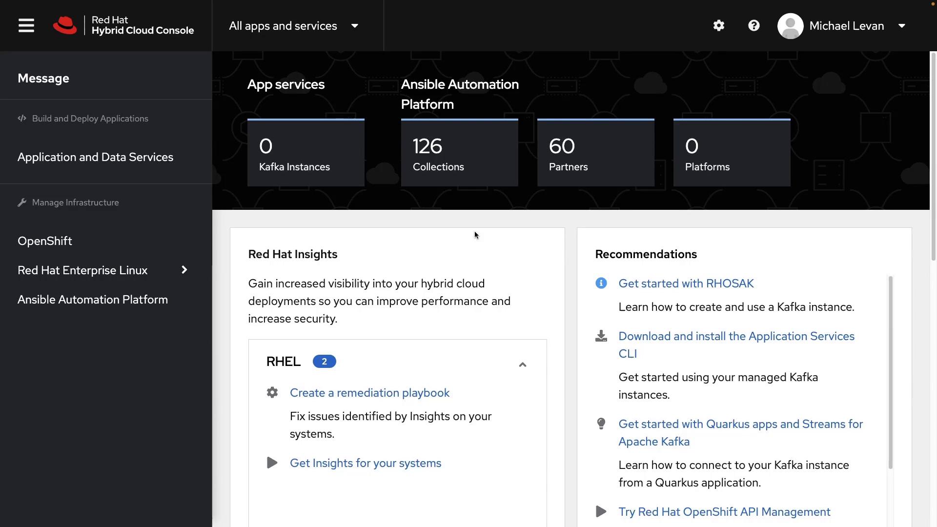 Screenshot of the Red Hat Hybrid Cloud Console dashboard. It shows App services and Ansible Automation Platform metrics (Kafka Instances 0, Collections 126, Partners 60) with a left navigation menu for OpenShift, RHEL and other services.
