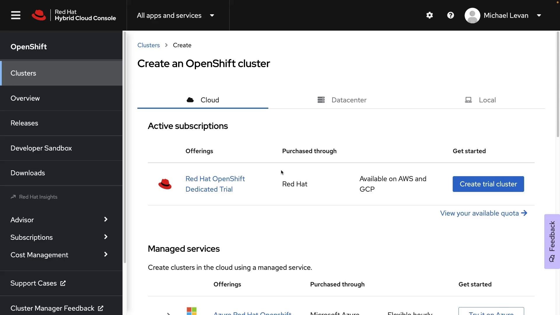 A screenshot of the Red Hat Hybrid Cloud Console showing the "Create an OpenShift cluster" page with Active subscriptions and a "Create trial cluster" button. The left sidebar displays navigation items like Clusters, Overview, Releases, and Downloads.