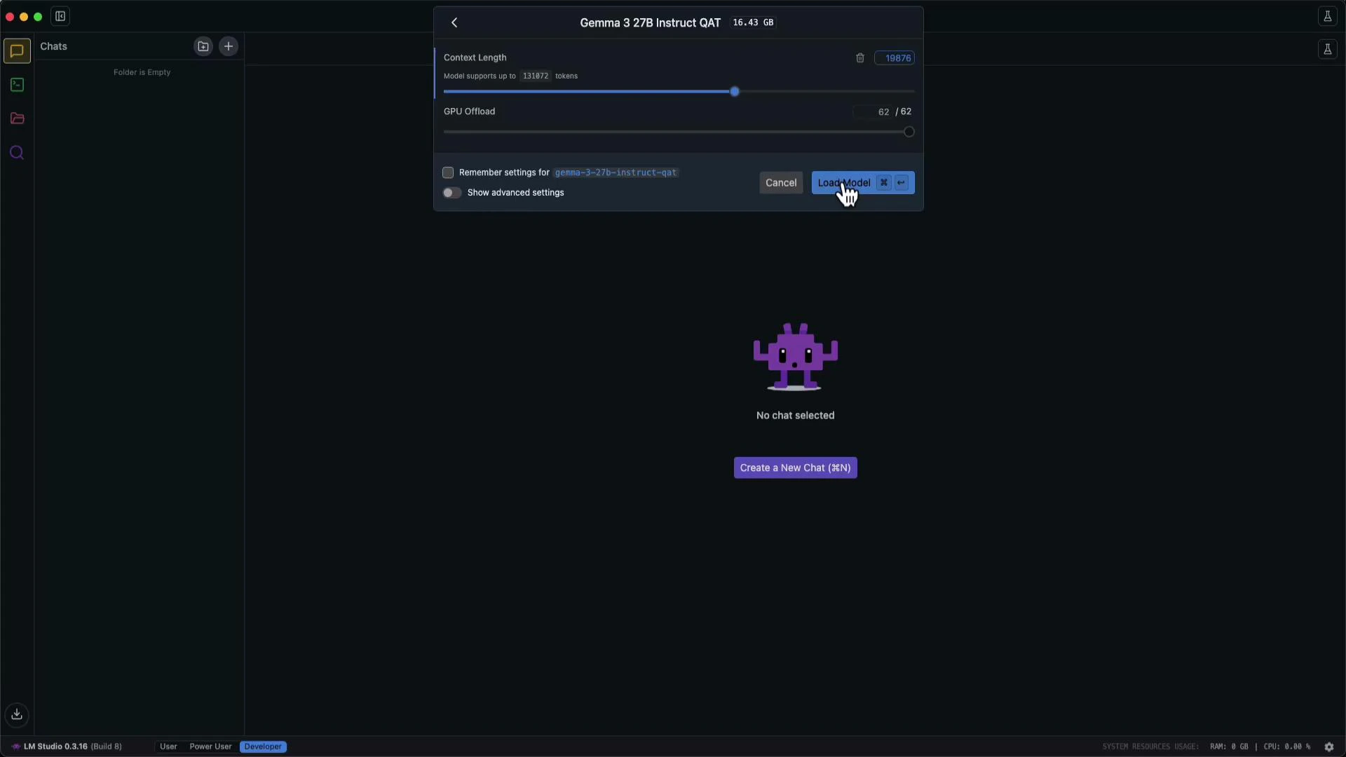 A dark-mode app window (LM Studio) with a modal for loading the "Gemma 3 27B Instruct QAT" model, showing context length and GPU settings and a highlighted "Load Model" button. The main pane shows a purple robot icon with the text "No chat selected" and a "Create a New Chat" button.