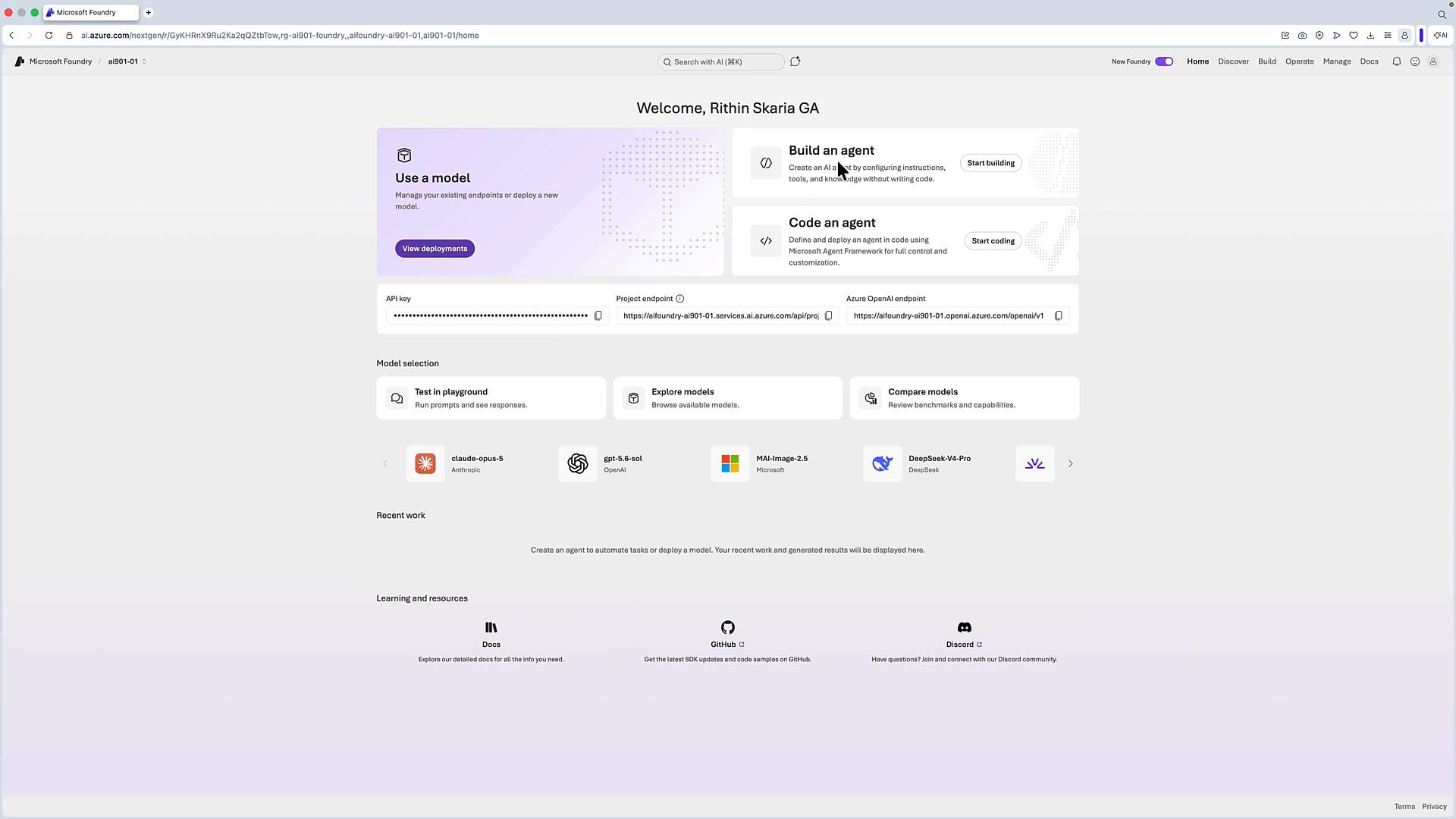 A screenshot of an AI platform dashboard (Microsoft/Azure Foundry) showing a welcome banner, buttons to "Use a model," "Build an agent," and "Code an agent," plus an API key field. The page also displays model selection cards and links to docs, GitHub, and community resources.