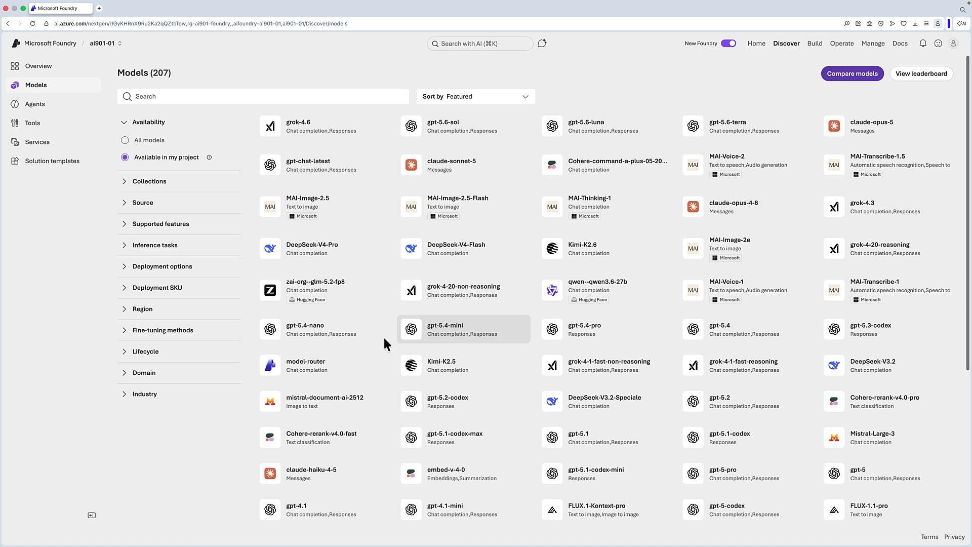 A browser screenshot of the Microsoft Foundry/Azure AI "Models" page showing a searchable catalog of many AI models (GPT, Claude, Grok, MAI, etc.) with filters in a left sidebar and model tiles arranged in columns. The top bar includes navigation and compare/view leaderboard buttons.
