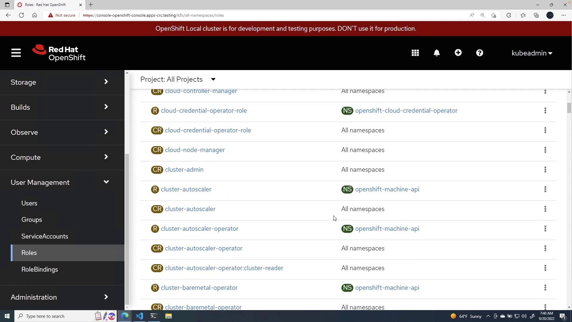 A screenshot of the Red Hat OpenShift web console showing the Roles page with a list of cluster roles and their namespaces on the right and the admin navigation menu (Storage, Builds, User Management, Roles) on the left. The top banner notes this is a local cluster for development and testing.