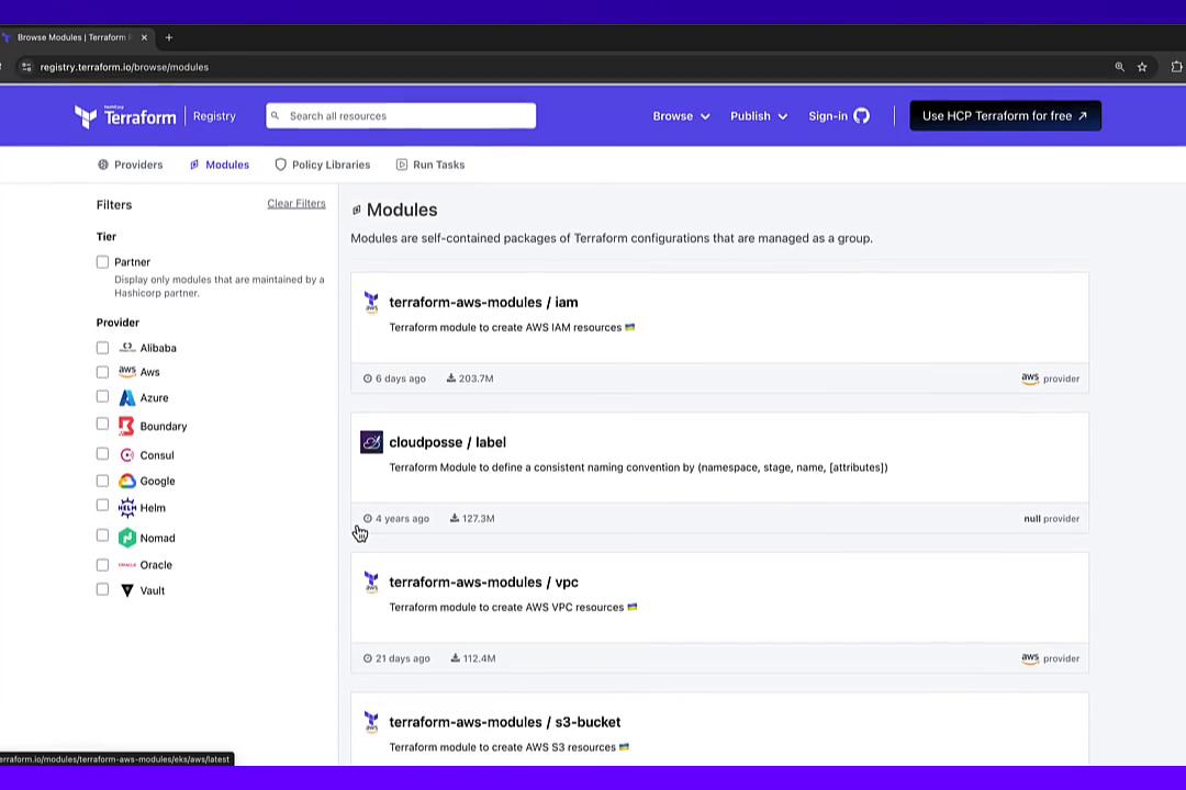 A browser screenshot of the Terraform Registry showing a list of modules (e.g., terraform-aws-modules/iam, cloudposse/label, terraform-aws-modules/vpc) with provider filters in a left sidebar. The page has a purple header with search and navigation controls.