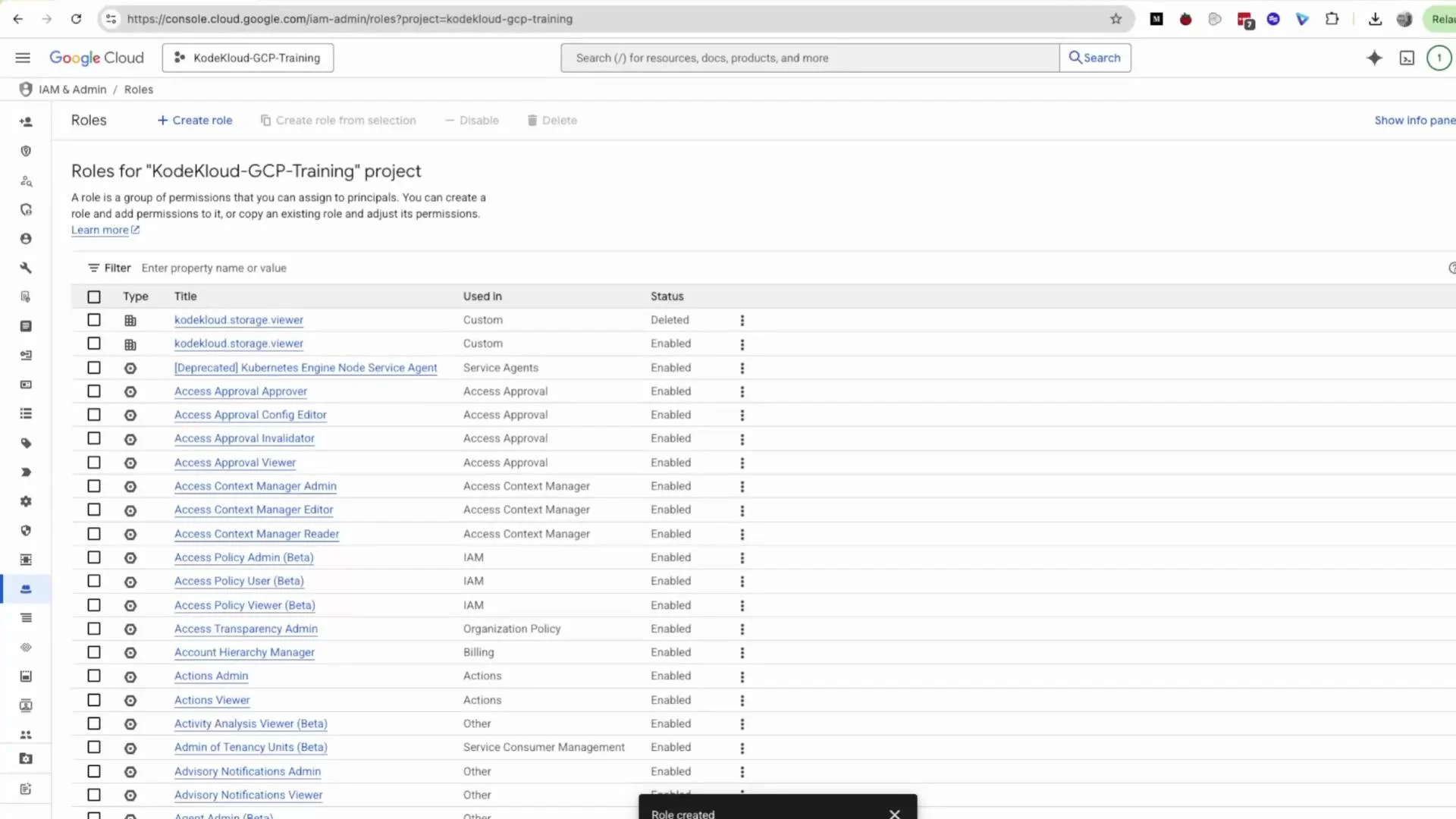 A screenshot of the Google Cloud Console showing the IAM & Admin "Roles" page for the "KodeKloud-GCP-Training" project. It lists role names, where they're used, and their status (enabled/deleted) in a table.