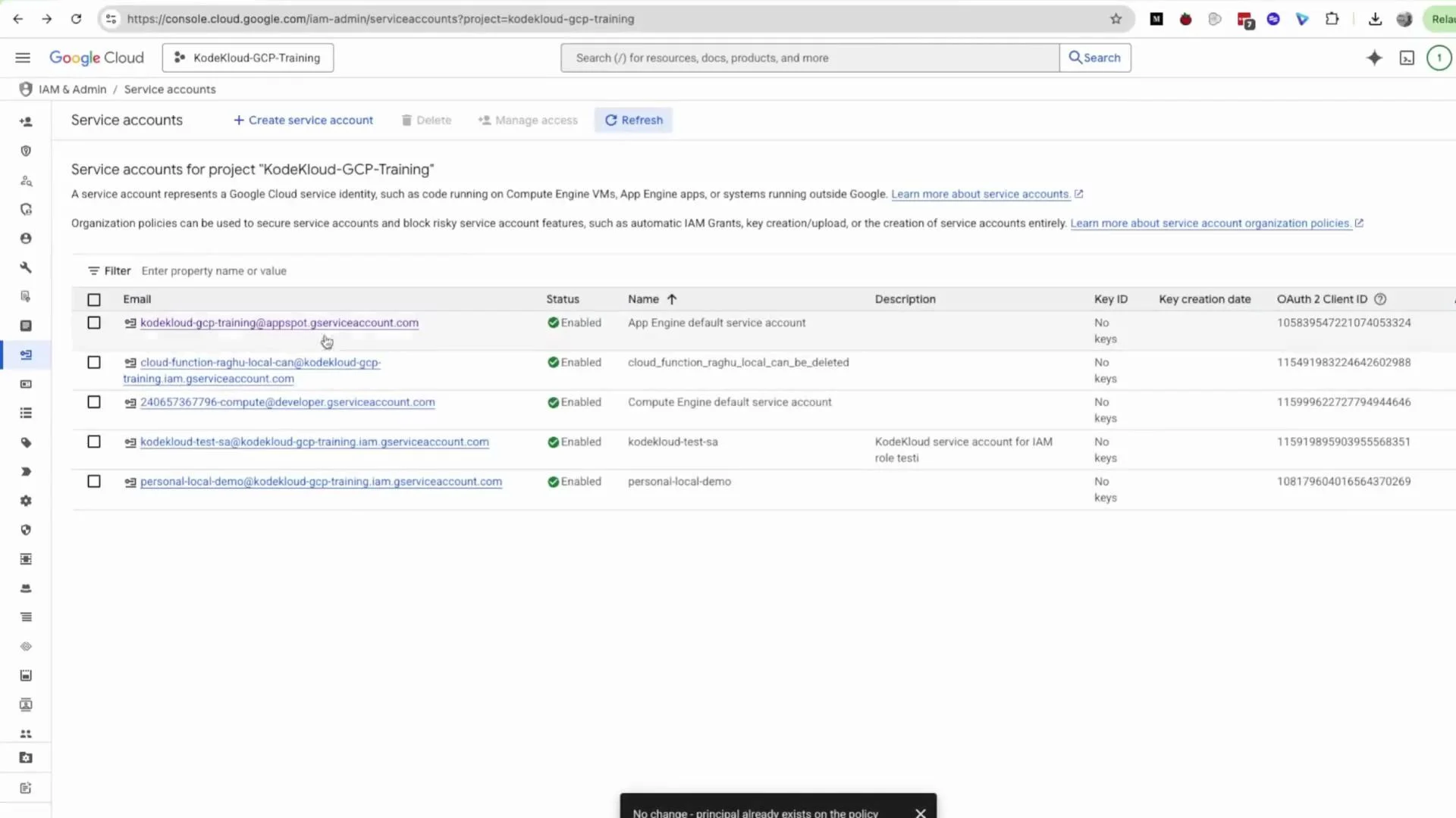 A screenshot of the Google Cloud Console showing the IAM & Admin "Service accounts" page for the project "KodeKloud-GCP-Training." It displays a table of service account emails, their statuses (Enabled), names, descriptions, and OAuth2 client IDs.