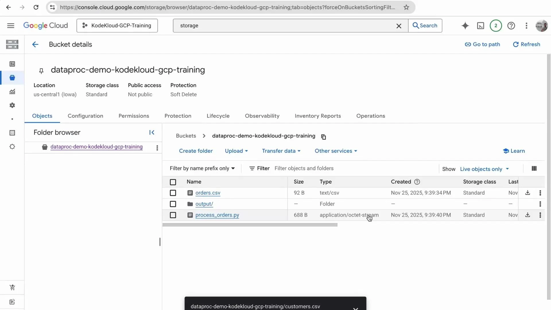 A Google Cloud Console screenshot showing the details of a Storage bucket named "dataproc-demo-kodekloud-gcp-training" with location us-central1 and Standard storage class. The objects list shows files like orders.csv, an output/ folder, and process_orders.py.