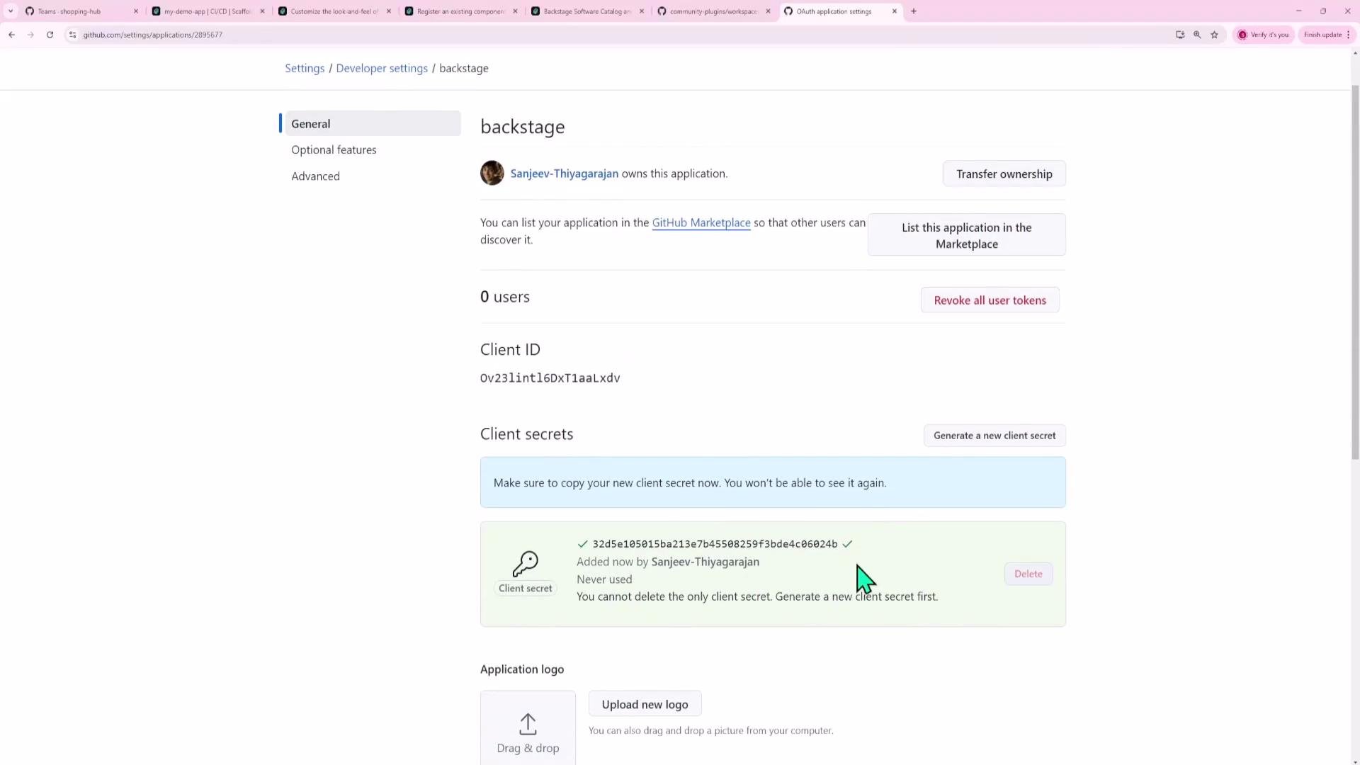 A screenshot of the GitHub Developer settings for an OAuth application named "backstage." It shows the client ID and a generated client secret along with buttons for transfer ownership, listing in the Marketplace, revoking tokens, and uploading an application logo.