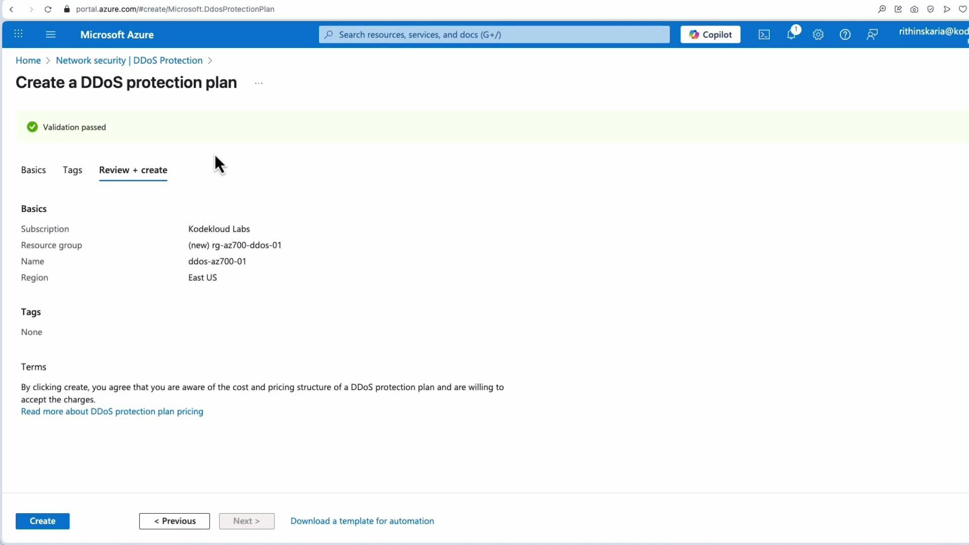 A Microsoft Azure portal screenshot of the "Create a DDoS protection plan" review page showing "Validation passed." It displays basics like subscription "Kodekloud Labs", resource group "(new) rg-az700-ddos-01", plan name "ddos-az700-01", and region "East US."