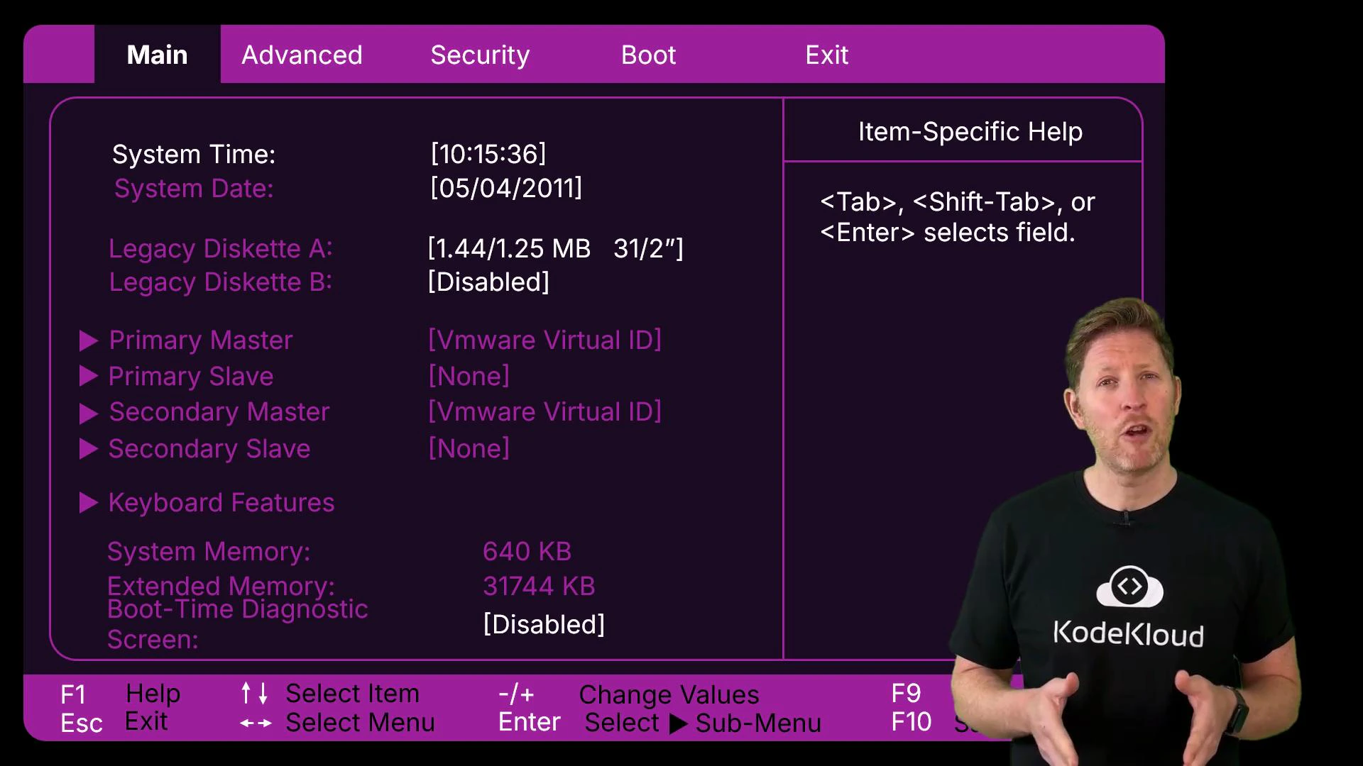 A purple-themed computer BIOS/settings screen is displayed on the left showing system time, disk drive entries and memory info. On the right, a man in a black KodeKloud t-shirt stands and gestures as if presenting.
