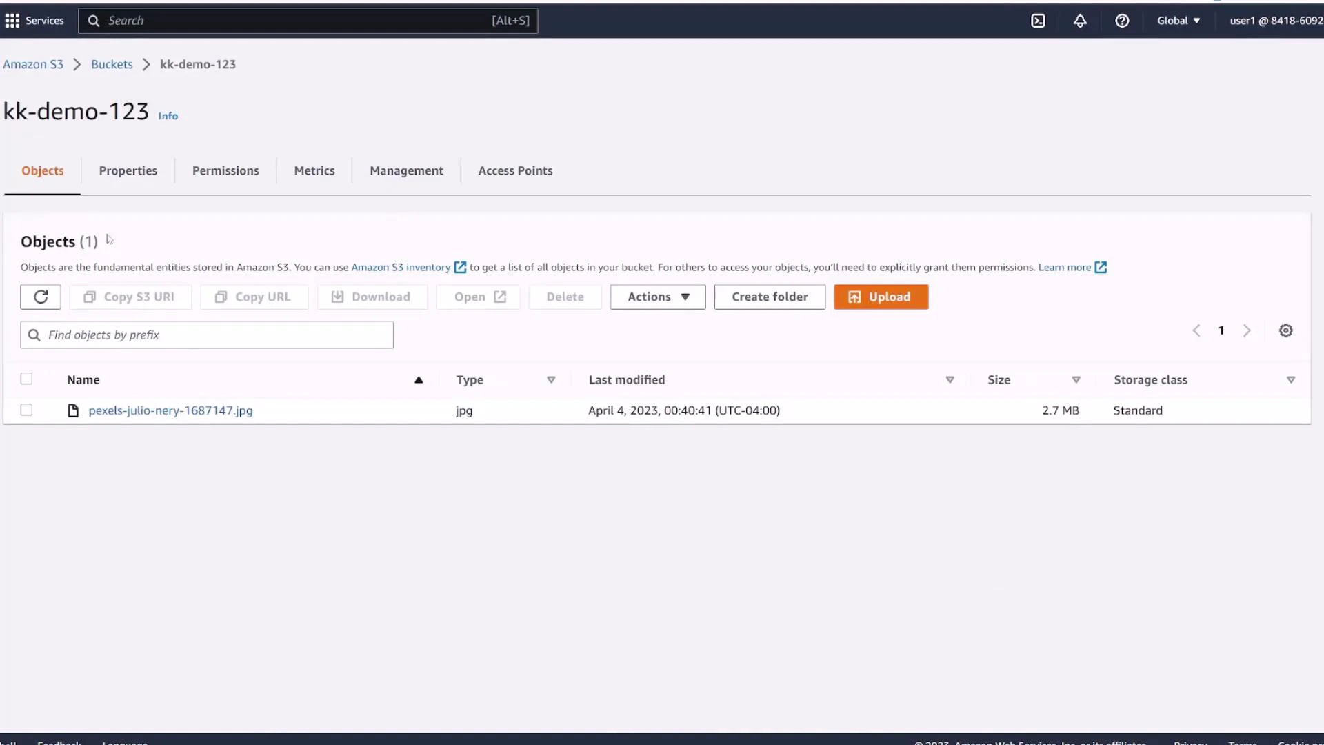Screenshot of an Amazon S3 bucket named "kk-demo-123" showing the Objects tab with one file (pexels-julio-nery-1687147.jpg) listed, size 2.7 MB and last modified April 4, 2023.