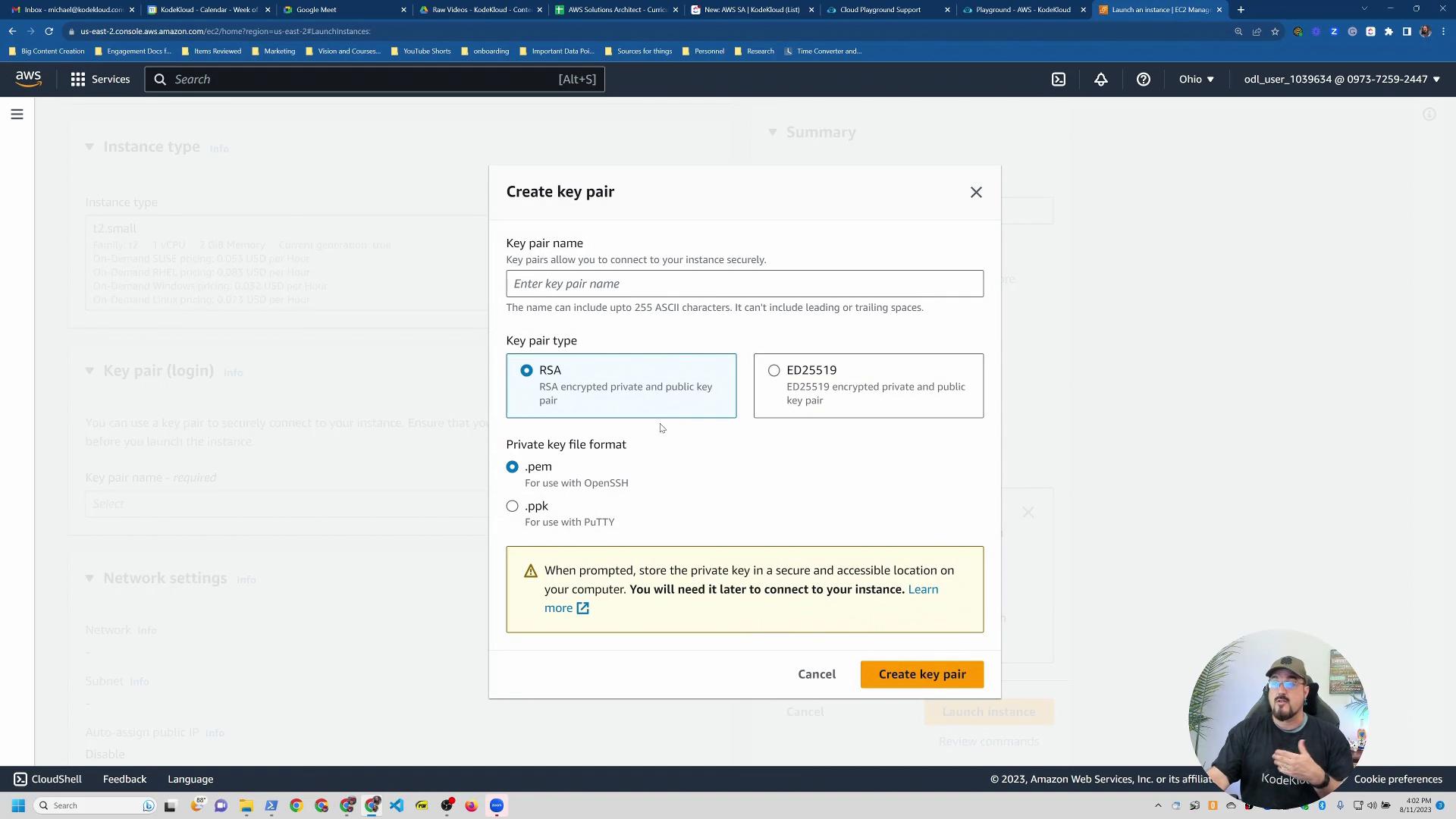 The screenshot shows the AWS EC2 "Create key pair" dialog with fields for the key pair name, key type (RSA or ED25519), and private key file format (.pem or .ppk). A small video overlay of a person speaking appears in the bottom-right corner.