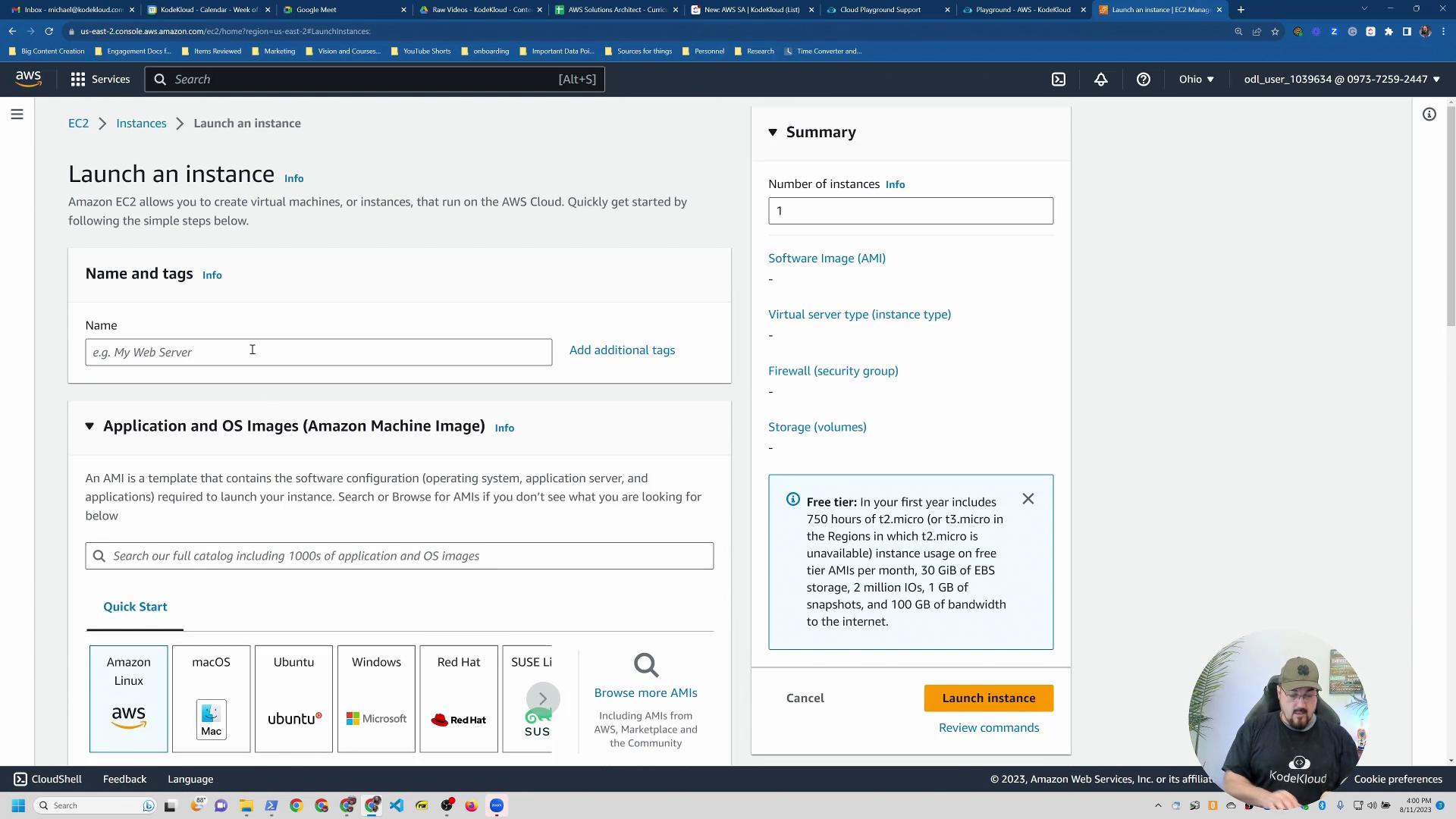 A screenshot of the AWS EC2 "Launch an instance" web console showing the Name and tags section, Application and OS Images (AMIs) options, and a Summary panel on the right. A small circular video overlay of a person appears in the bottom-right corner.