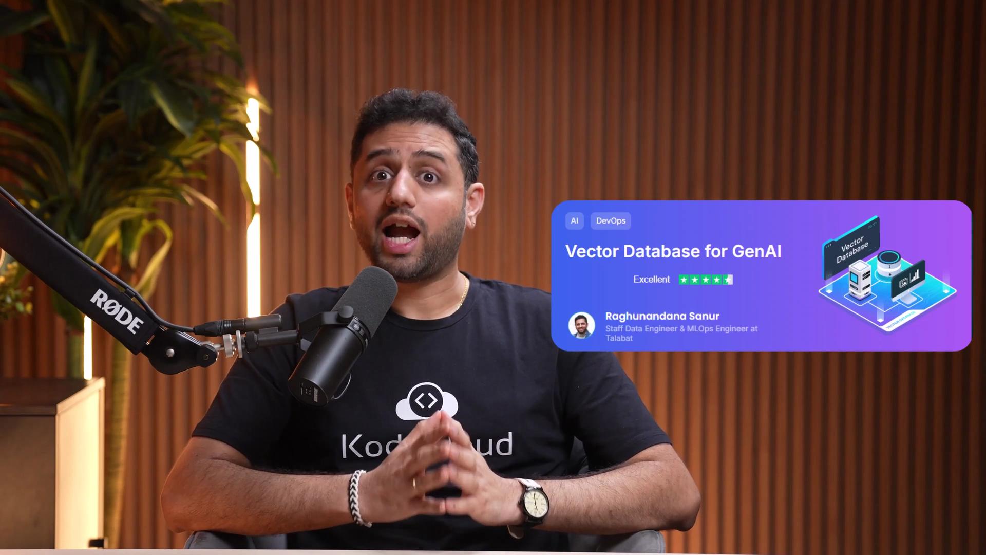 A man is speaking into a microphone, and beside him is a graphic promoting a "Vector Database for GenAI" with a positive rating and the name "Raghunandana Sanur."