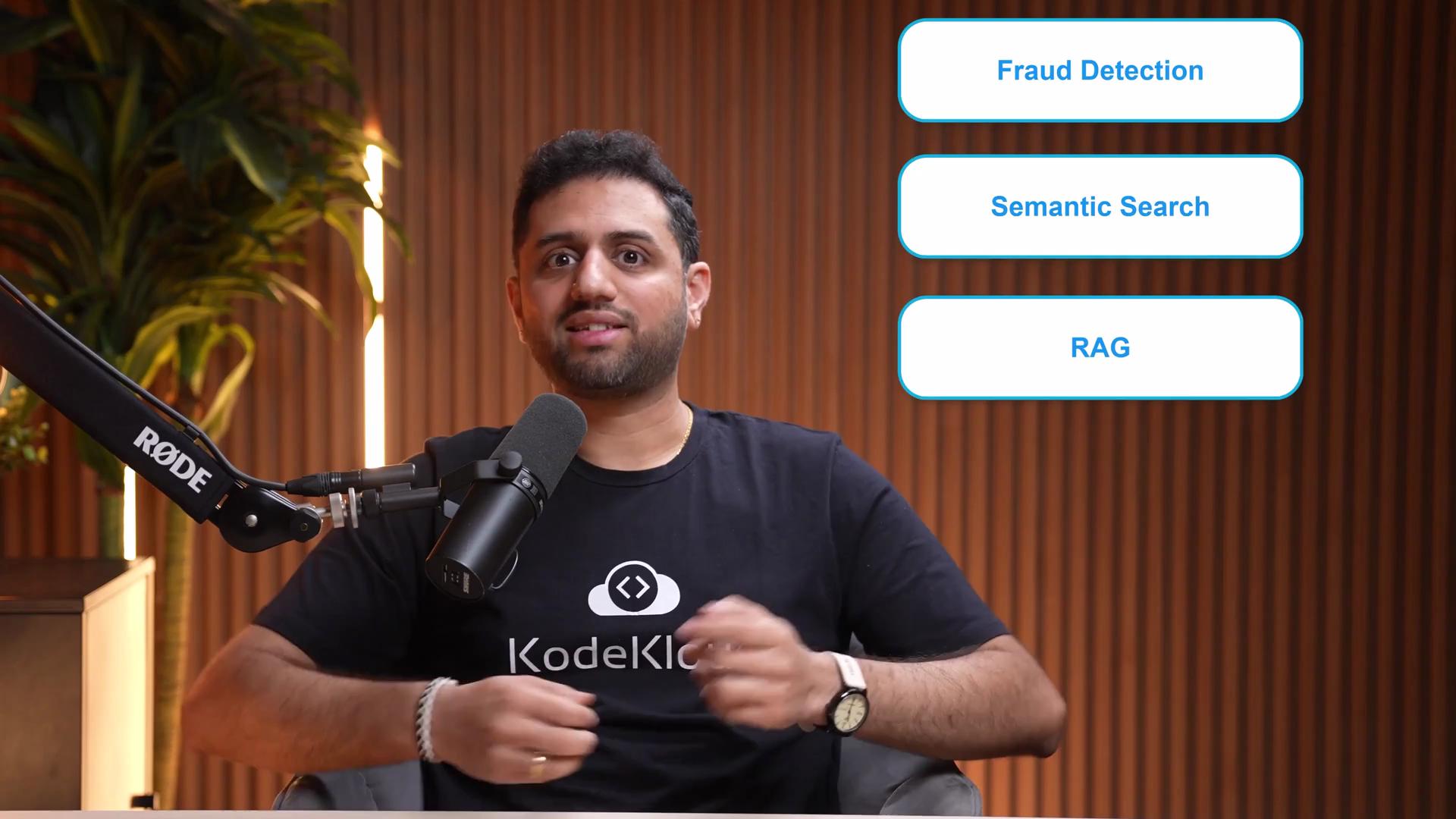 A person is speaking into a microphone in a studio setting, with text boxes beside them listing "Fraud Detection," "Semantic Search," and "RAG."