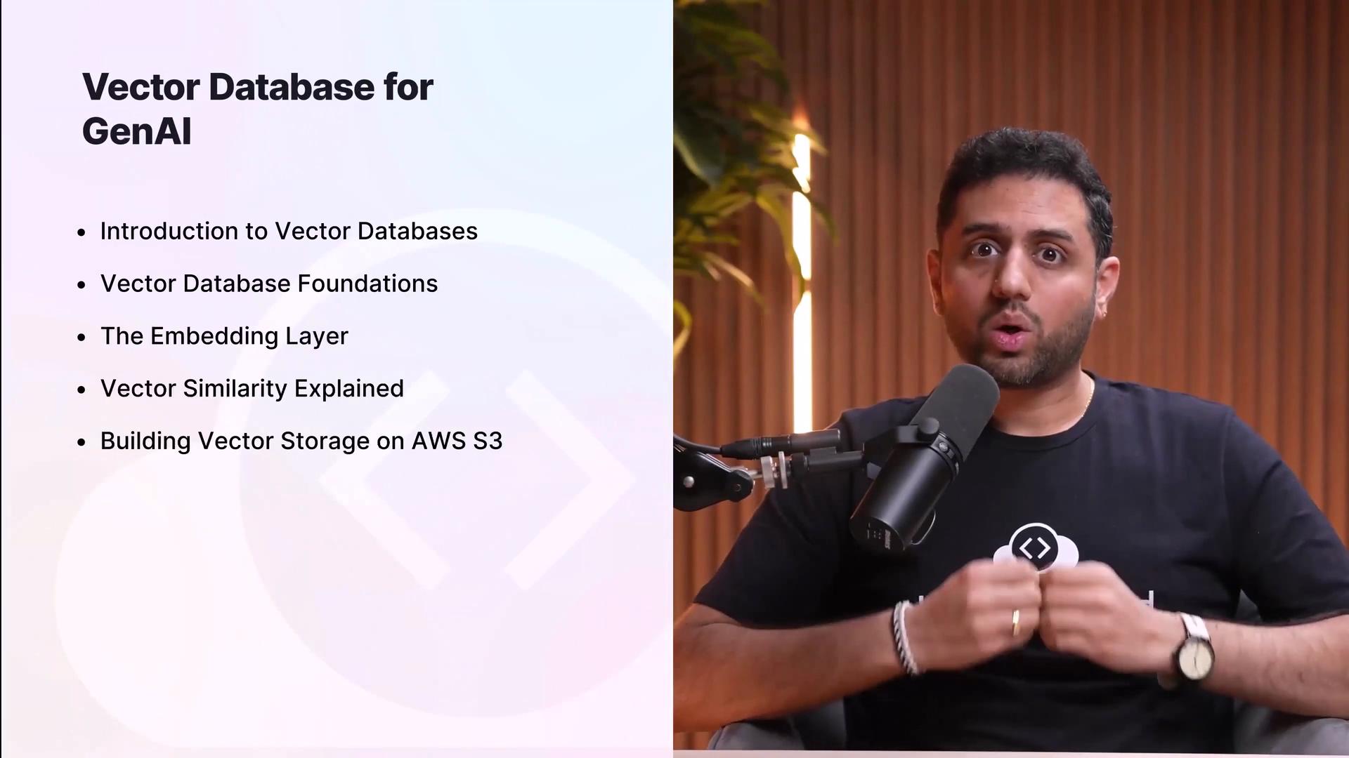 The image shows a person speaking into a microphone with a presentation slide about vector databases for GenAI, listing topics like database foundations and AWS S3 storage.