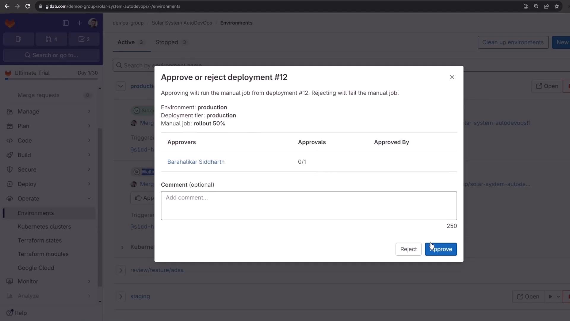 A GitLab web UI showing a modal dialog to approve or reject "deployment #12" for the production environment with fields for approvers and an optional comment. The dialog includes Reject and Approve buttons (the Approve button is highlighted).