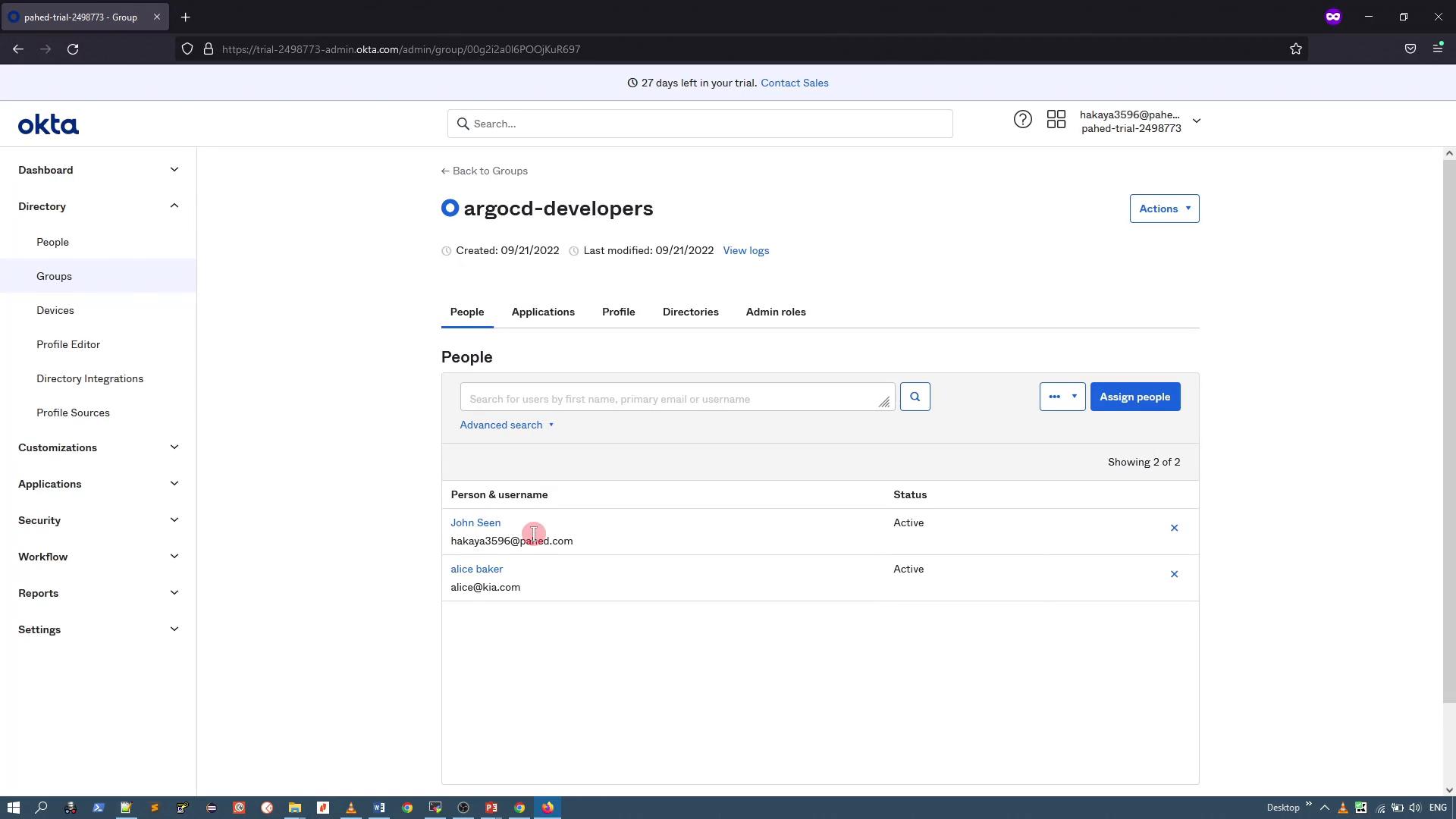 A screenshot of the Okta admin console open to the "argocd-developers" group page. The page shows a list of group members with their status and standard navigation/actions on the left and top.