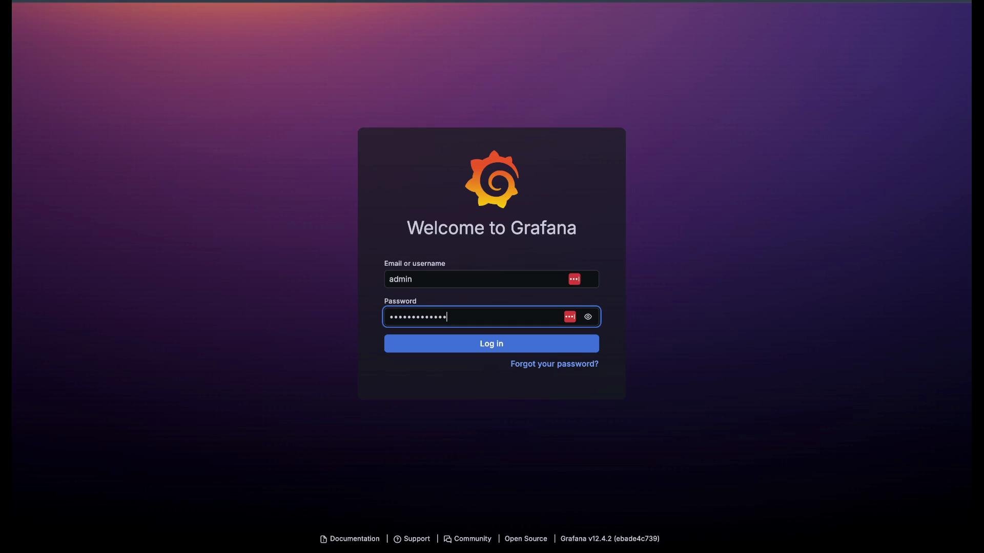 The image shows a Grafana login screen with fields for email or username and password against a gradient background. The "Log in" button is prominently displayed below the input fields.