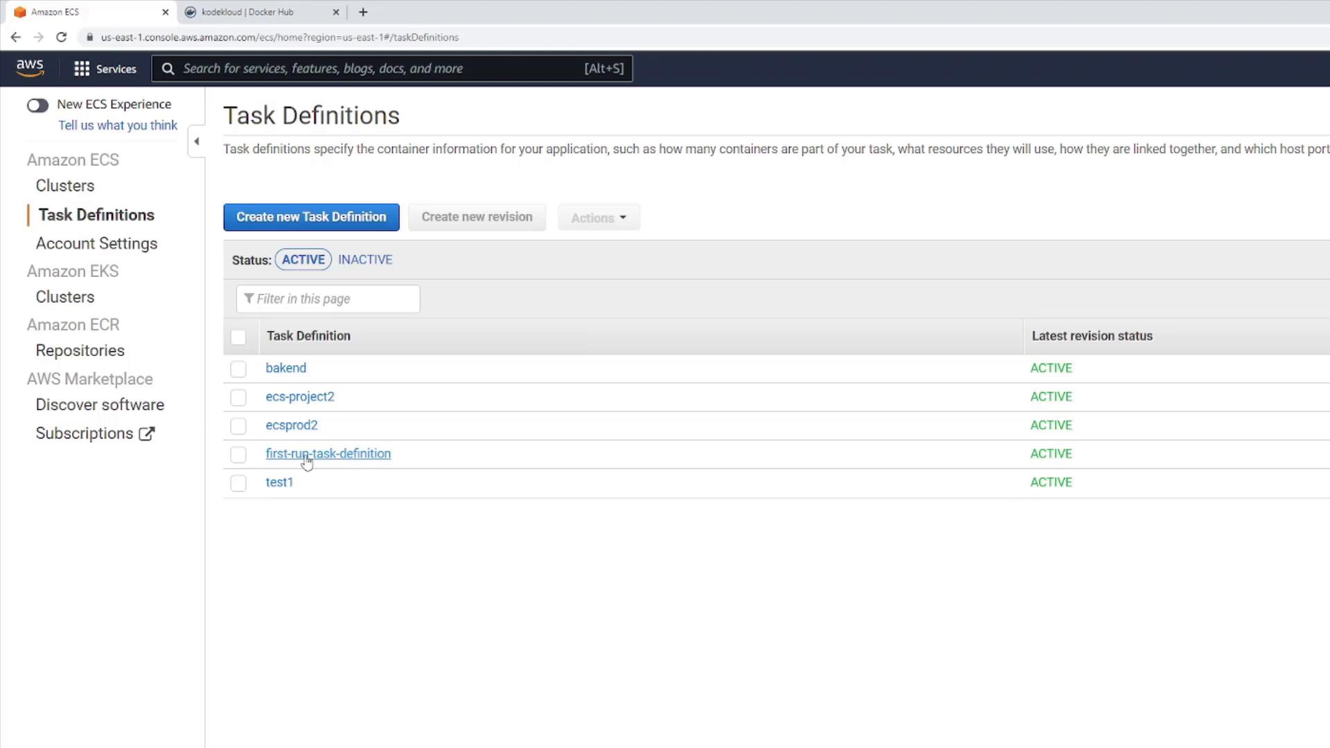 A screenshot of the AWS Management Console showing the Amazon ECS "Task Definitions" page. It lists several task definitions (bakend, ecs-project2, ecsprod2, first-run-task-definition, test1) with their latest revision statuses marked ACTIVE.