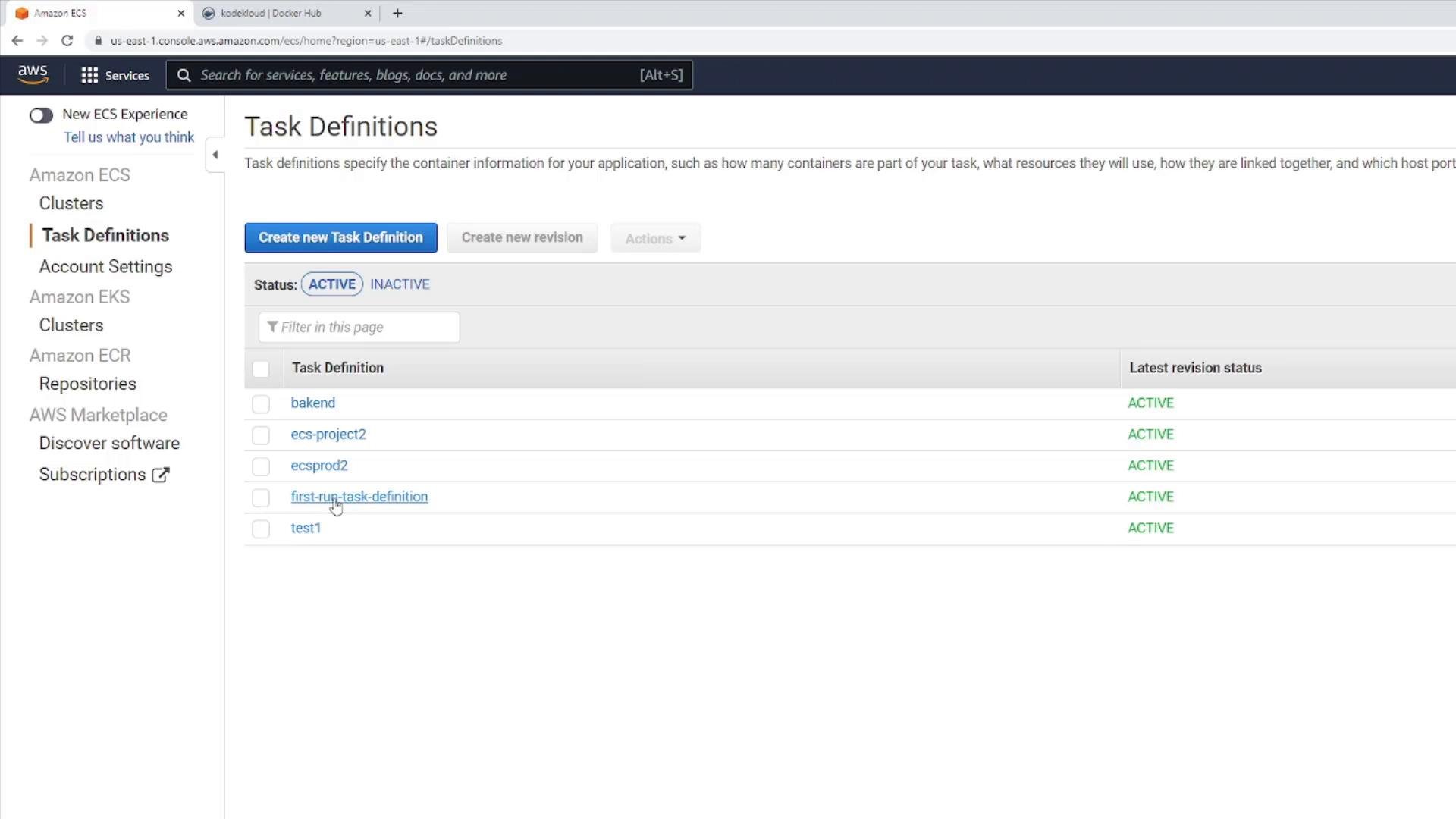 A screenshot of the AWS Management Console showing the Amazon ECS "Task Definitions" page. It lists several task definitions (bakend, ecs-project2, ecsprod2, first-run-task-definition, test1) with their latest revision statuses marked ACTIVE.