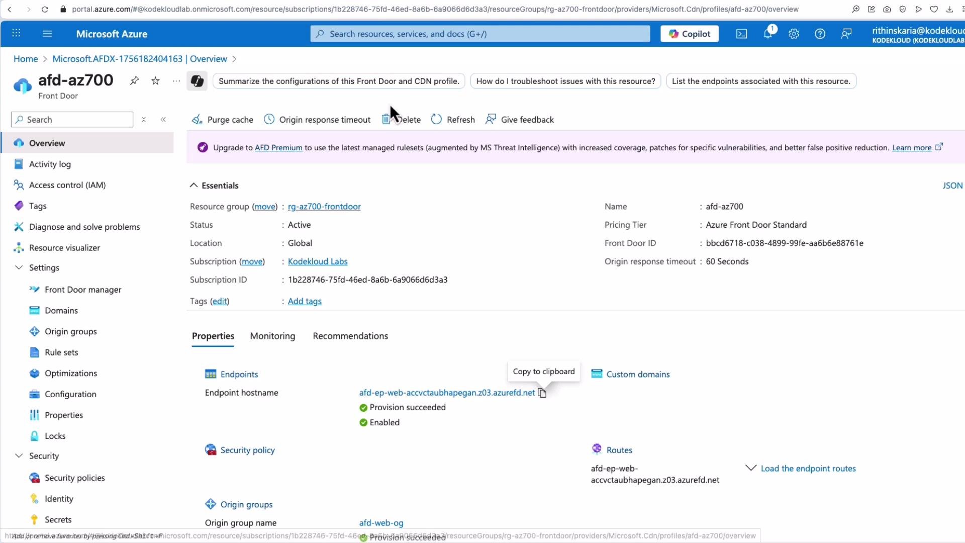The image shows the Microsoft Azure portal displaying the overview of a Front Door configuration. It includes information such as resource group, status, location, subscription details, and endpoints.