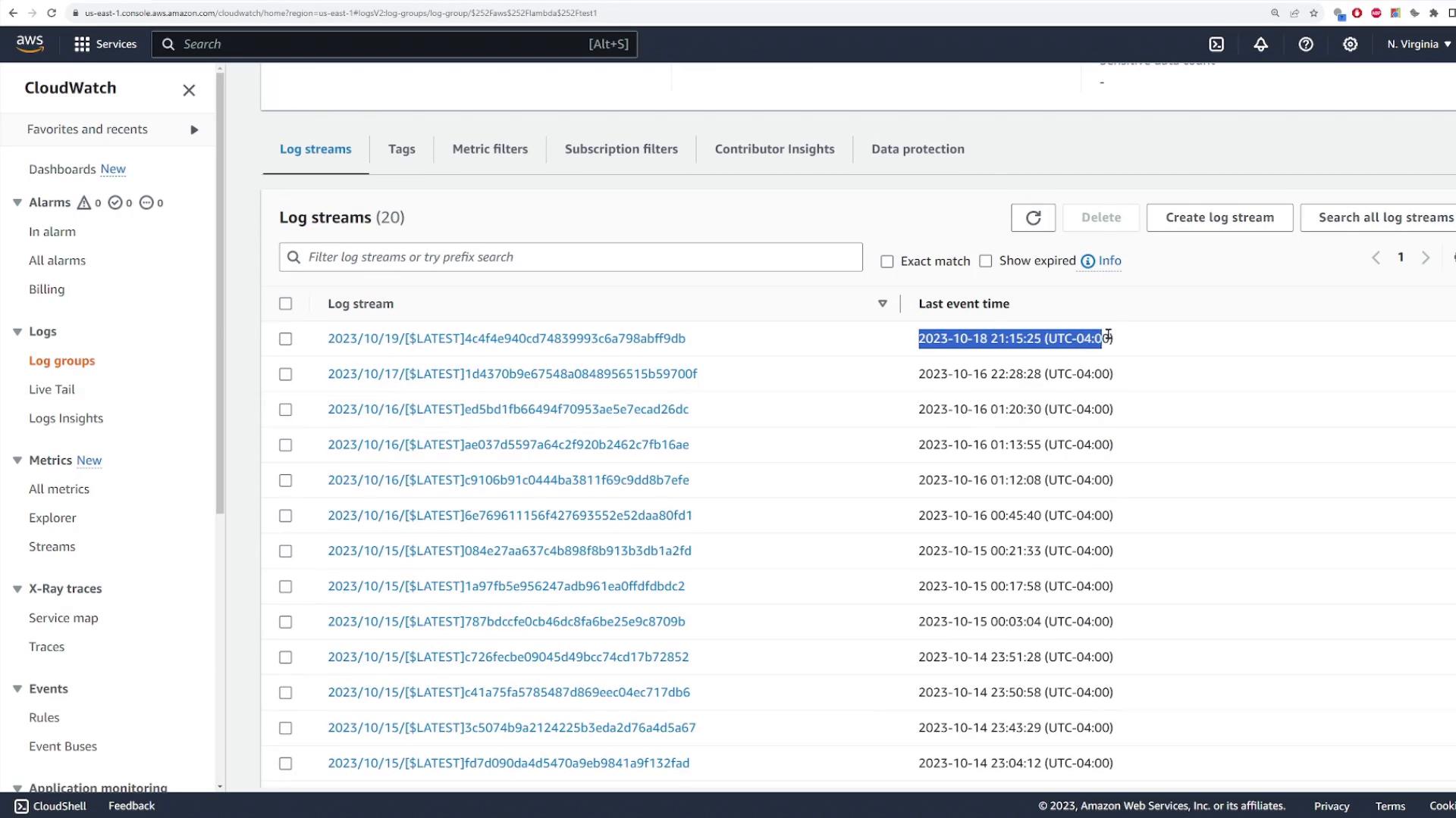 A screenshot of the AWS CloudWatch console showing a Log streams list with stream names and their "Last event time" timestamps. One entry is highlighted, showing 2023-10-18 21:15:25 (UTC-04:00).