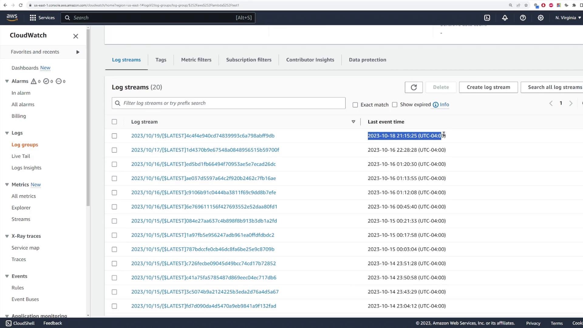 A screenshot of the AWS CloudWatch console showing a Log streams list with stream names and their "Last event time" timestamps. One entry is highlighted, showing 2023-10-18 21:15:25 (UTC-04:00).