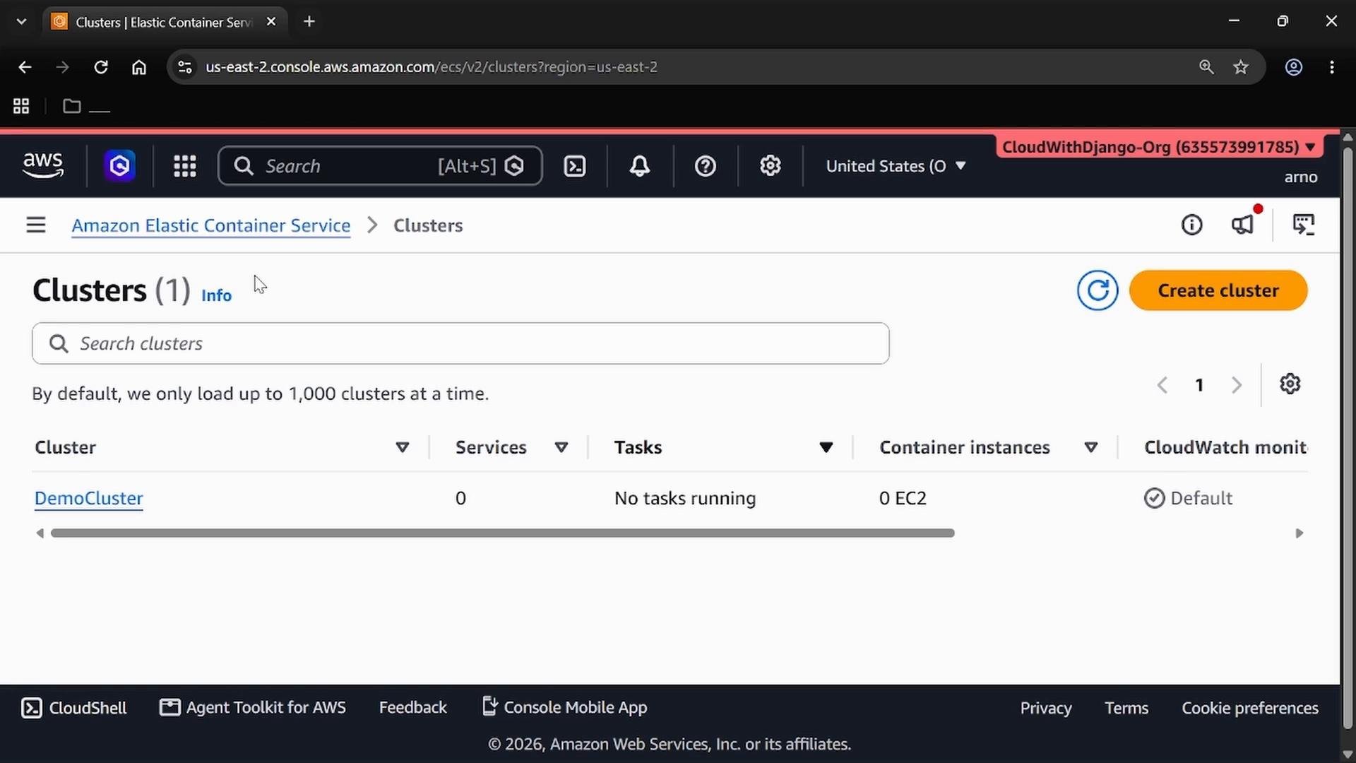 A screenshot of the AWS Management Console showing the Amazon Elastic Container Service (ECS) Clusters page. It lists one cluster named "DemoCluster" with no tasks running and an orange "Create cluster" button.