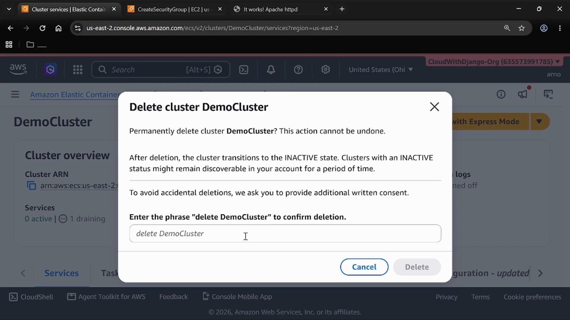 A screenshot of the AWS Elastic Container Service console showing a confirmation dialog to permanently delete a cluster named "DemoCluster," requiring the user to type the phrase "delete DemoCluster" before deletion. The dialog includes Cancel and Delete buttons.