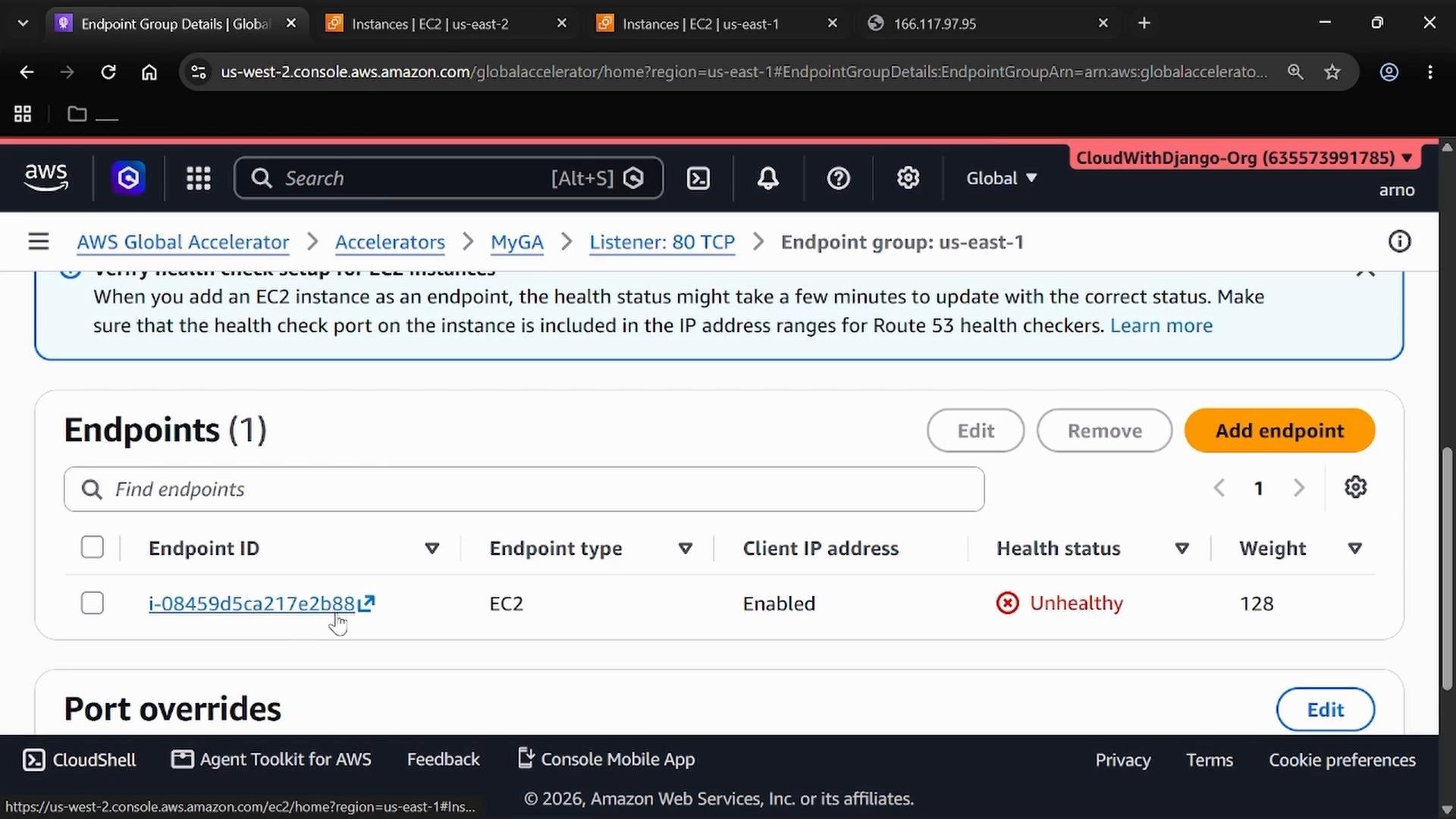 A screenshot of the AWS Global Accelerator console showing an endpoint group with one EC2 endpoint (i-08459...) listed as Enabled but marked "Unhealthy." The page shows controls to Edit, Remove, or Add endpoint and a section for port overrides.