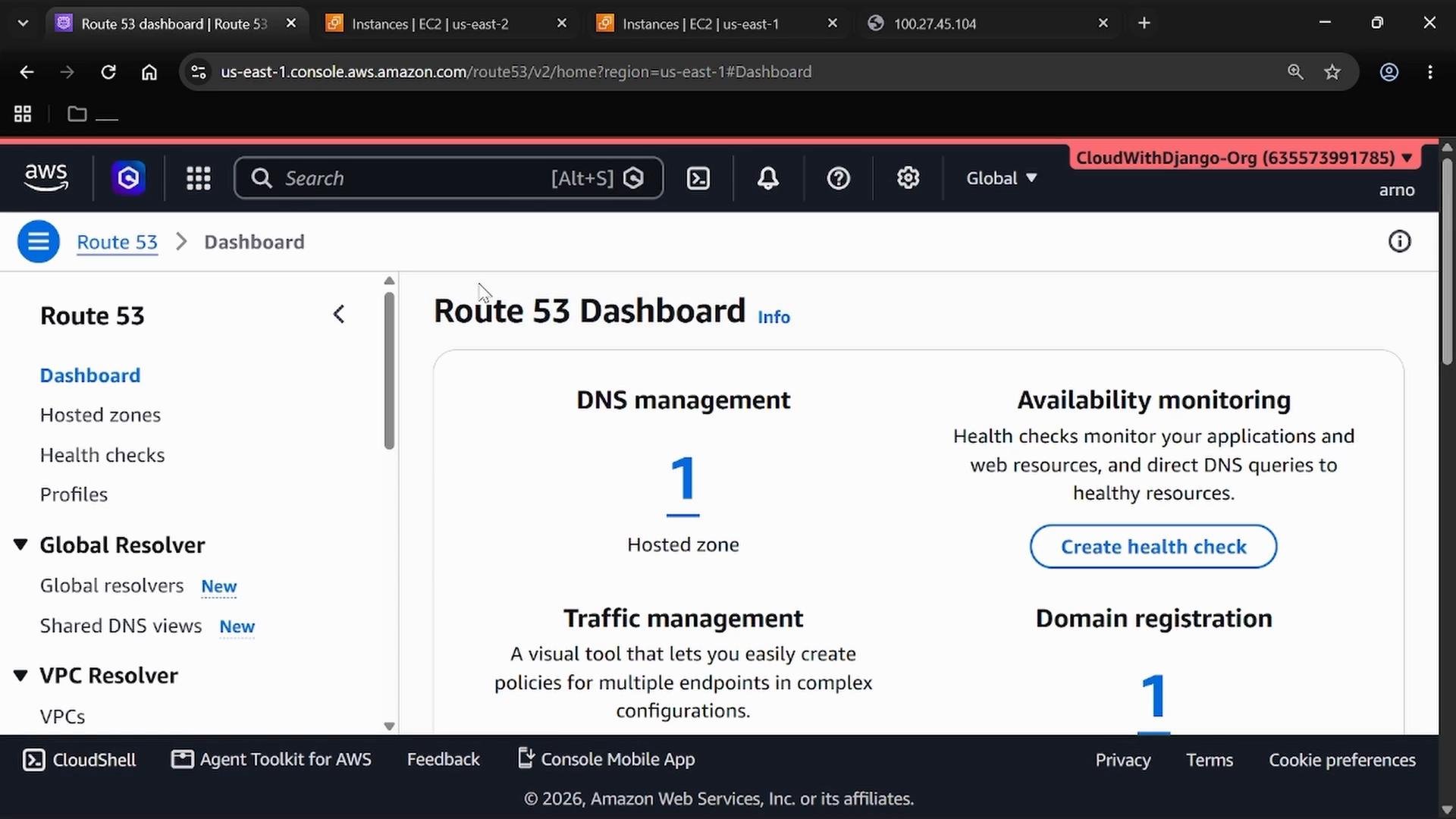 A screenshot of the AWS Route 53 Dashboard in a web browser, showing DNS management with one hosted zone and sections for availability monitoring, traffic management, and domain registration. The left sidebar displays navigation items like Dashboard, Hosted zones, Health checks, and Global Resolver.