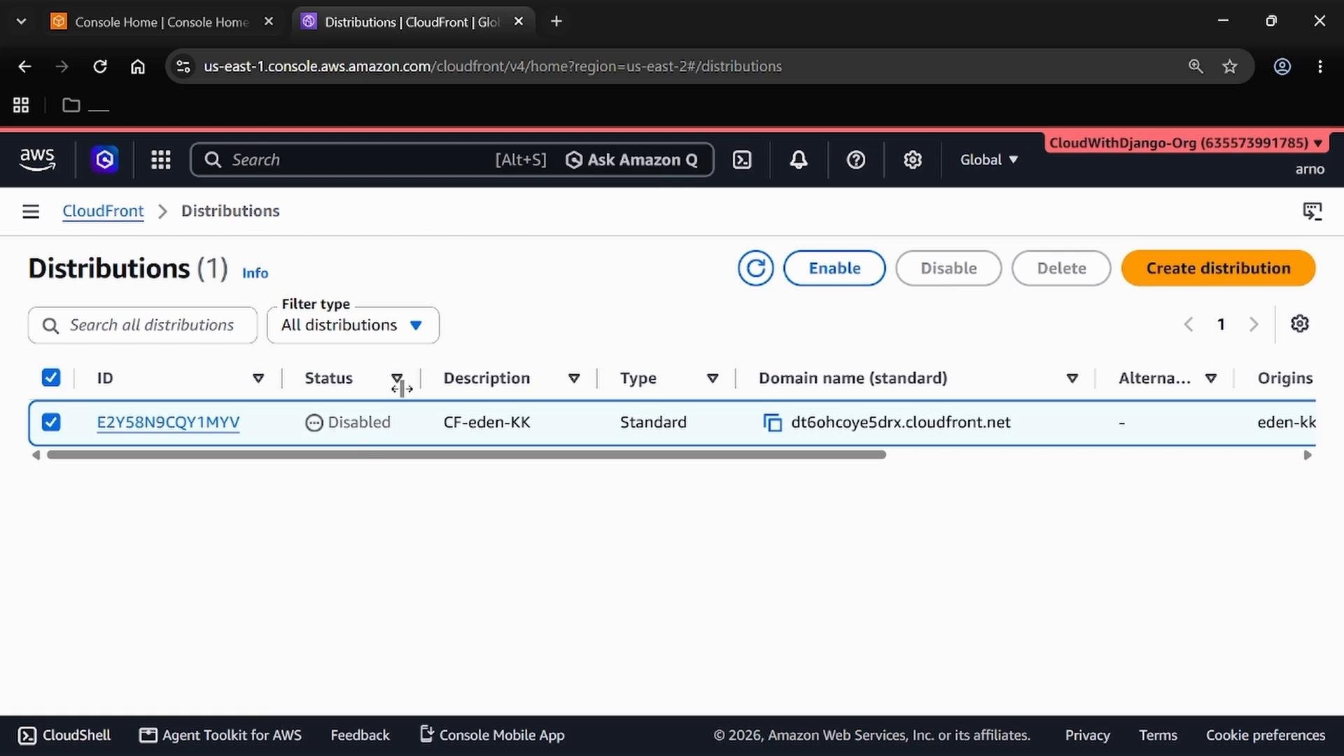 A screenshot of the AWS CloudFront Distributions console showing one distribution listed. The distribution is marked "Disabled" and displays a CloudFront domain (dt6ohcoye5drx.cloudfront.net) with controls to enable, disable, delete, or create distributions.